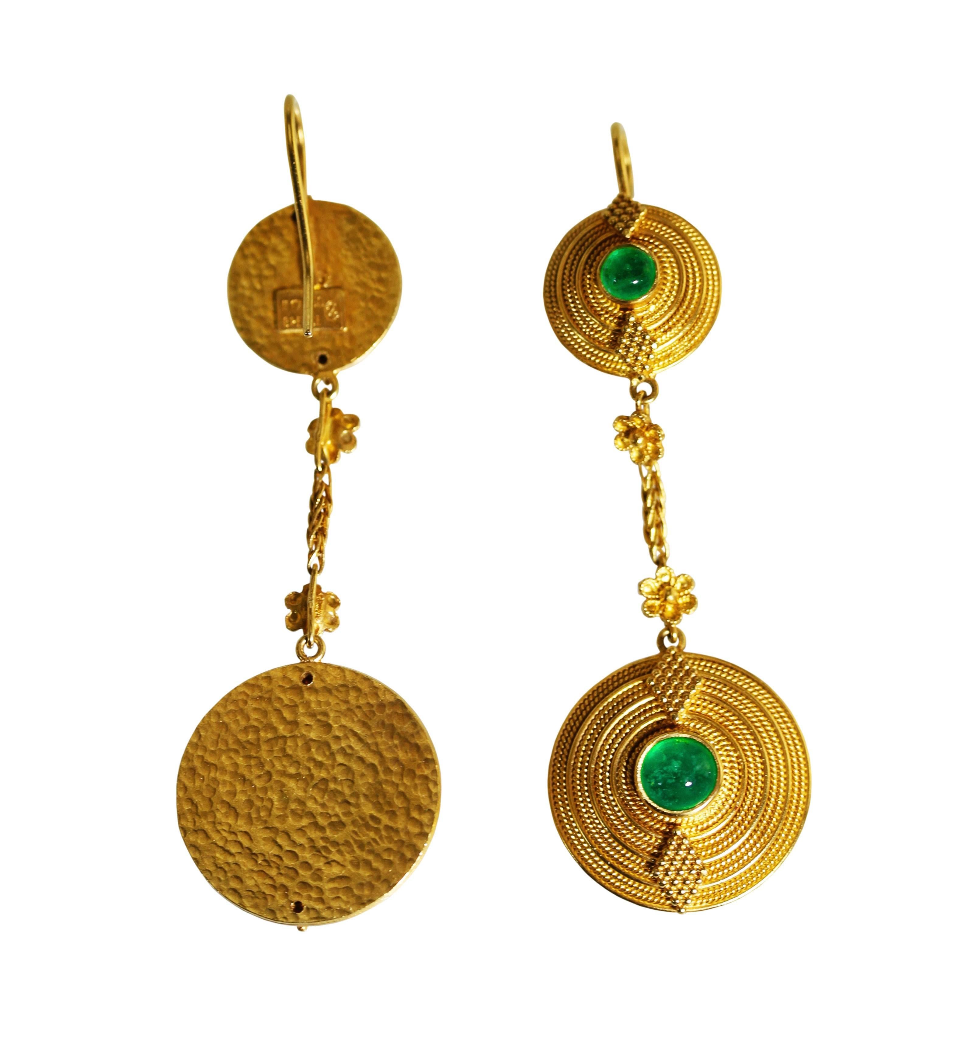 A pair 18 karat gold and emerald pendant-earrings by Lalaounis, Greece, designed as circular domed pendants suspended from links surmounted by smaller circular domes of similar style, set throughout with 4 cabochon emeralds weighing approximately