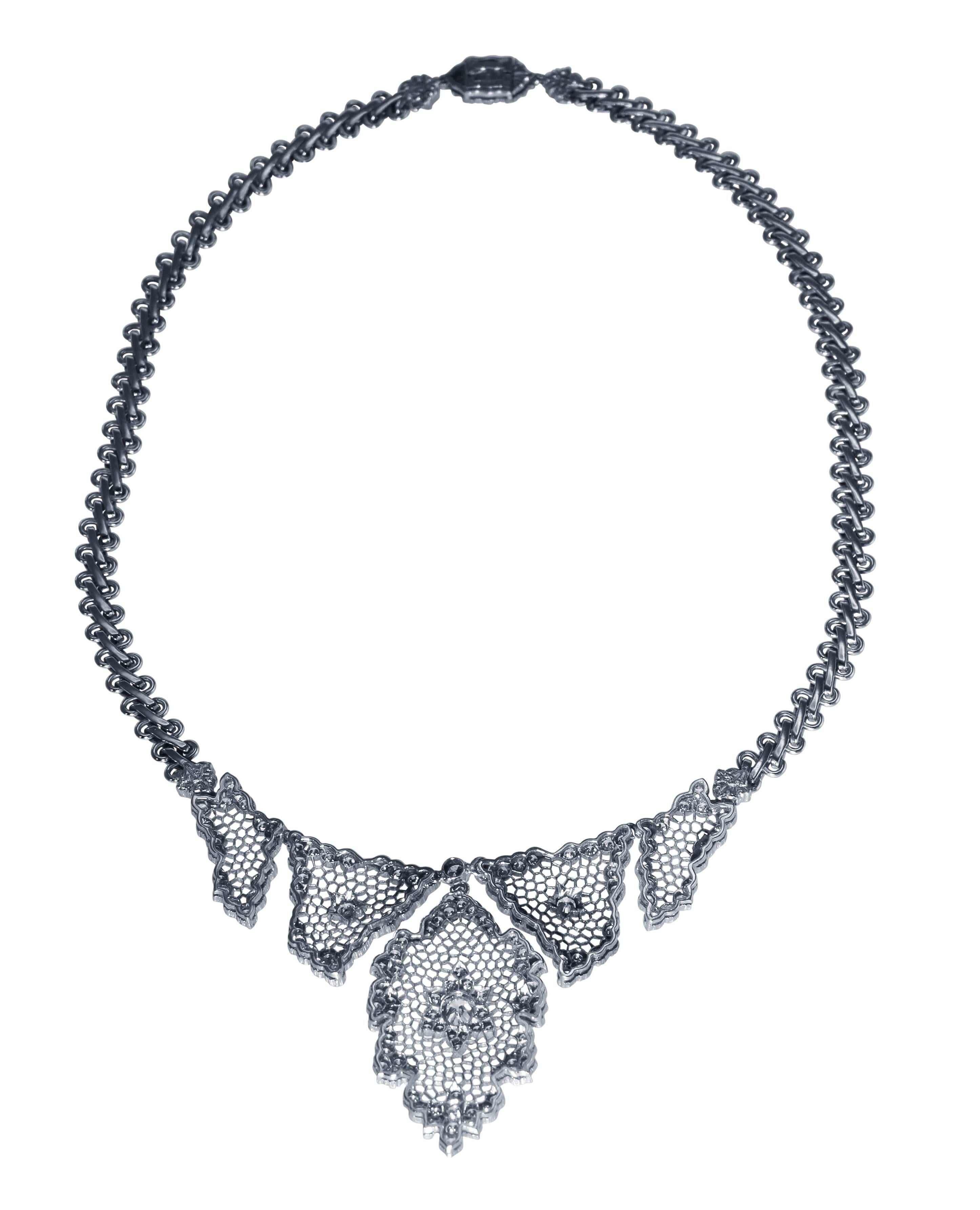 18 Karat White Gold and Diamond "Tulle" Necklace by Buccellati, Italy

• Signed Gianmaria Buccellati, Italy 18K
• French assay marks 
• 148 diamonds weighing 5.33 carats
• Length 15 1/2 inches
• Gross weight 46.2 grams
• Buccellati