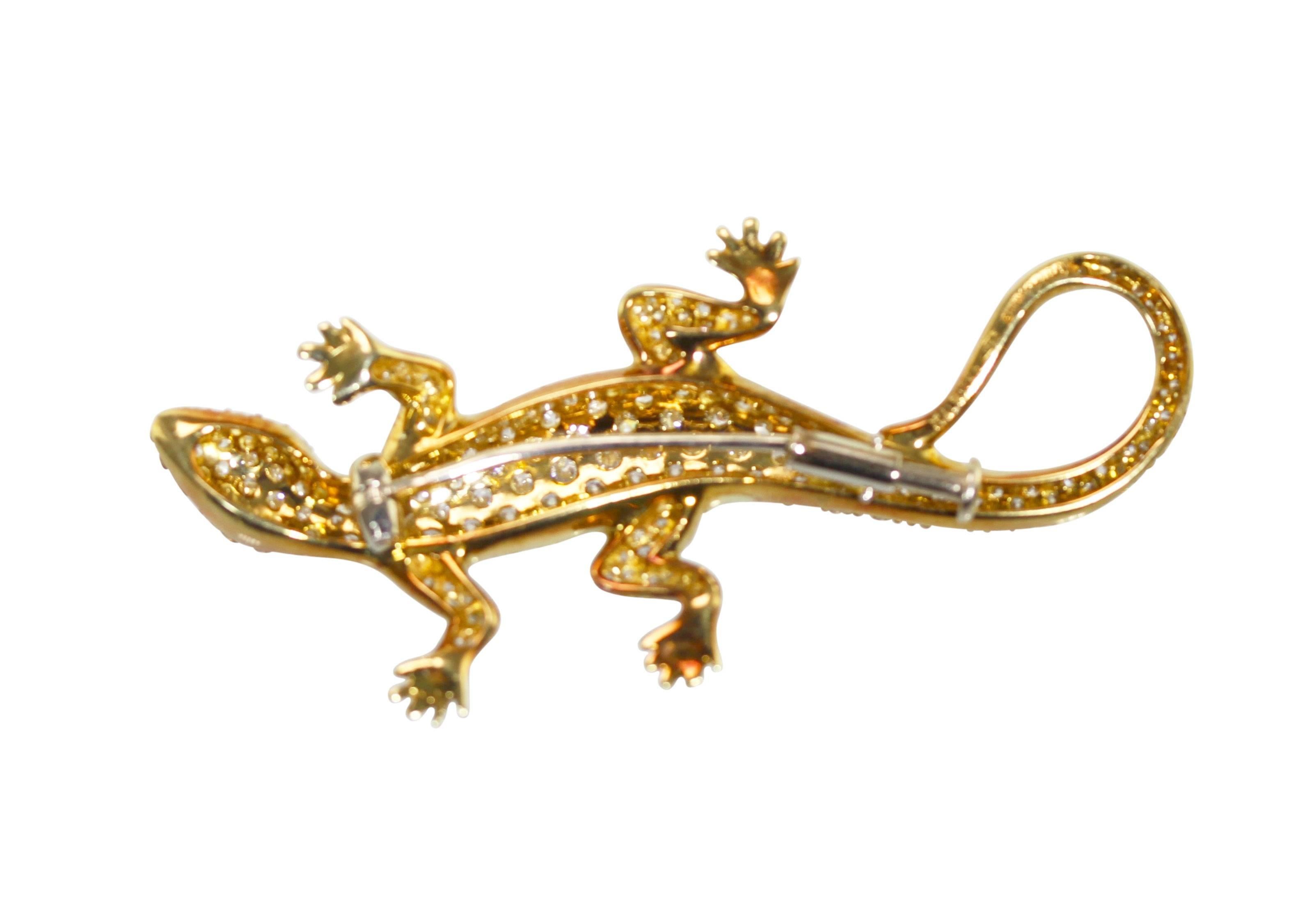 18 Karat Two-Tone Gold and Diamond Lizard Brooch, Italy
• Stamped 18k Italy 750 with Italian assay marks
• 200 round diamonds approximately 6.00 carats
• Measuring 2 1/4 by 1 1/8 inches, gross weight 12.4 grams