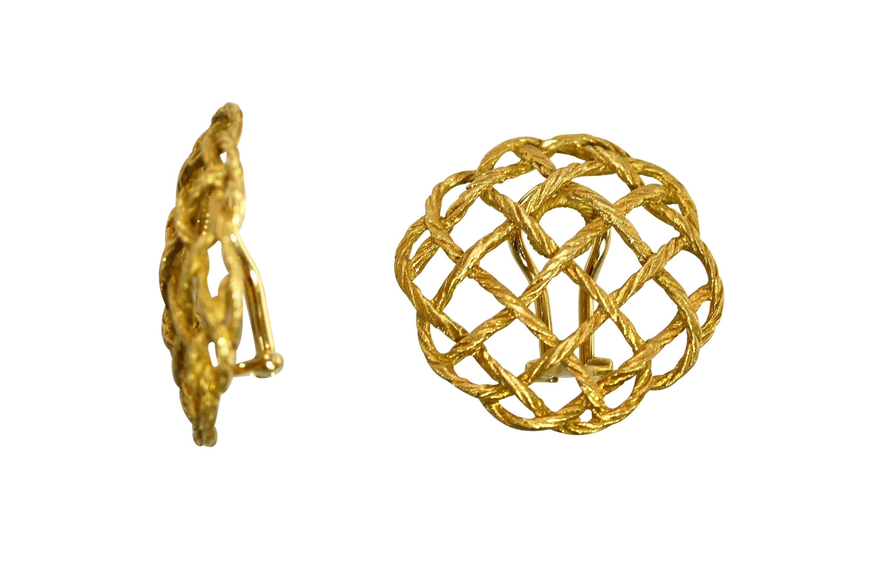 A pair of 18 karat yellow gold 'Crepe de Chine' earclips by Buccellati, Italy, designed as circular rope-twist weaves, measuring 1 1/8 by 1 1/8 inches, gross weight 13.8 grams, signed Buccellati, 18KT Italy, with Italian assay marks.