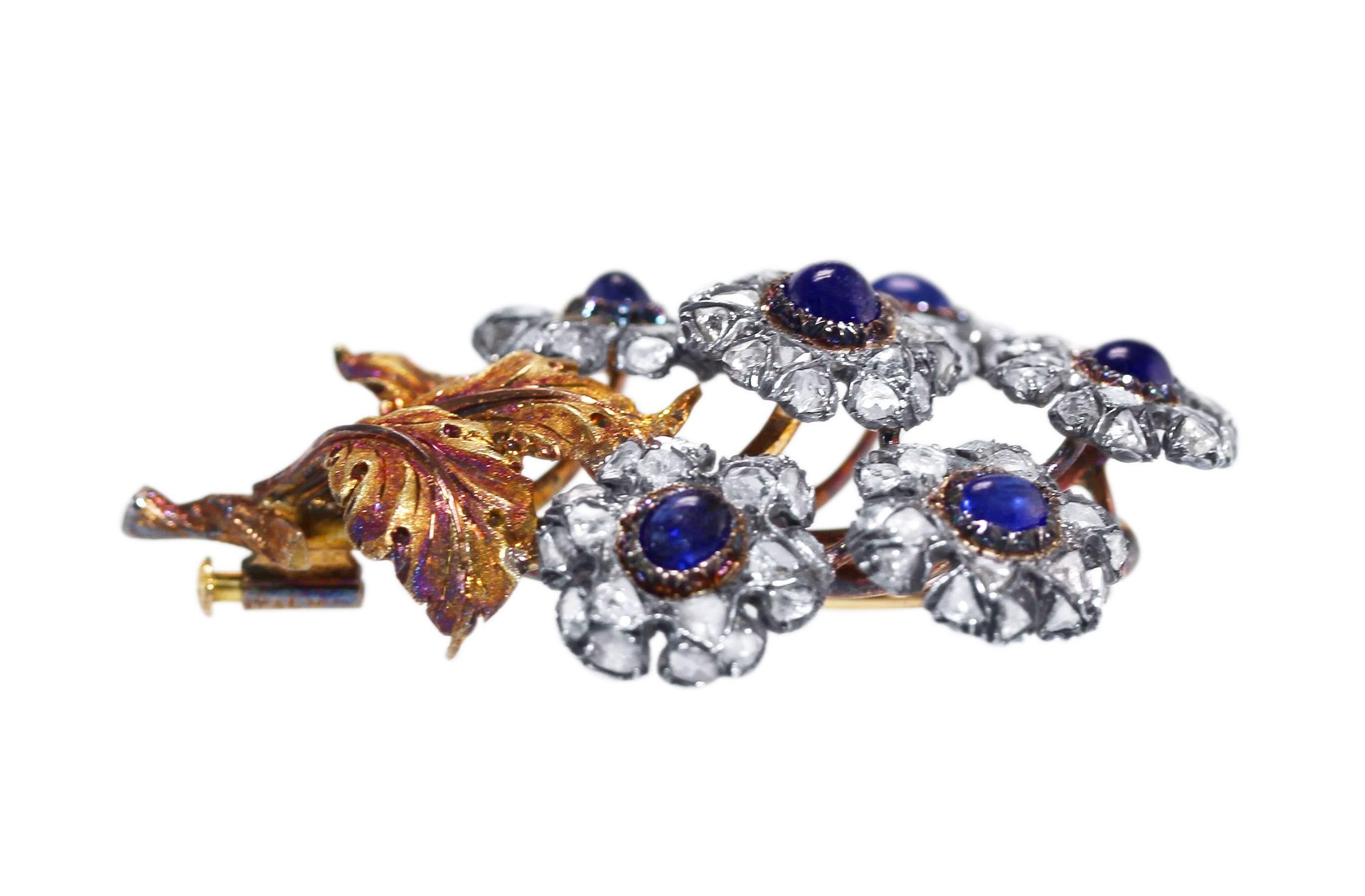 18 Karat Gold, Silver, Sapphire and Diamond Brooch by Mario Buccellati, Italy, circa 1935
• Signed Buccellati, Italy
• Accompanied by a recent Buccellati appraisal stating the replacement value as $64,000
• 6 cabochon sapphires, approximately 3.00