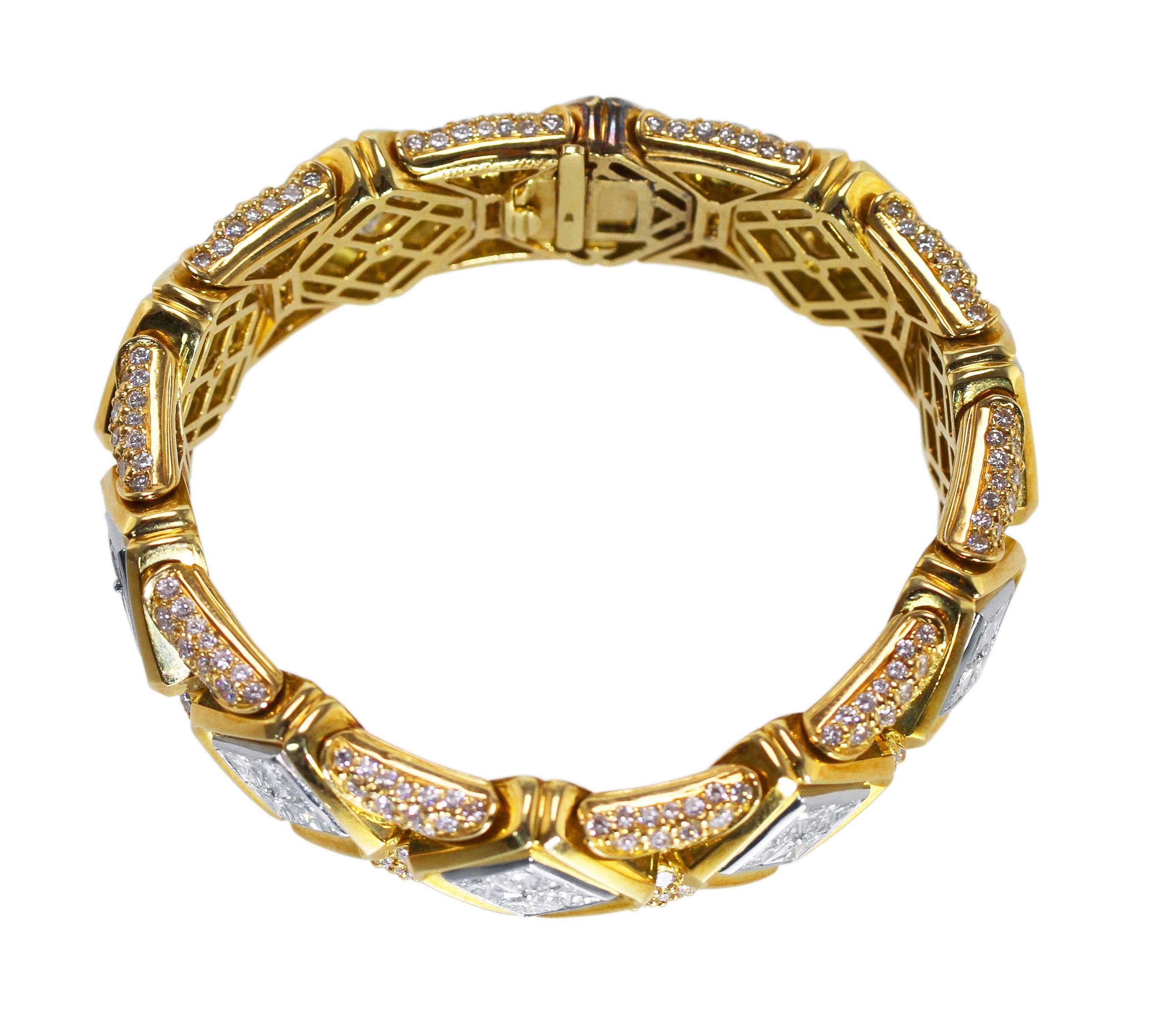 An 18 karat  yellow gold, platinum and diamond bracelet by Bulgari, Italy, designed as various square and rectangular plaques set with, the center ten plaques set with 40 princess-cut diamonds weighing approximately 18.00 carats, accented by 300