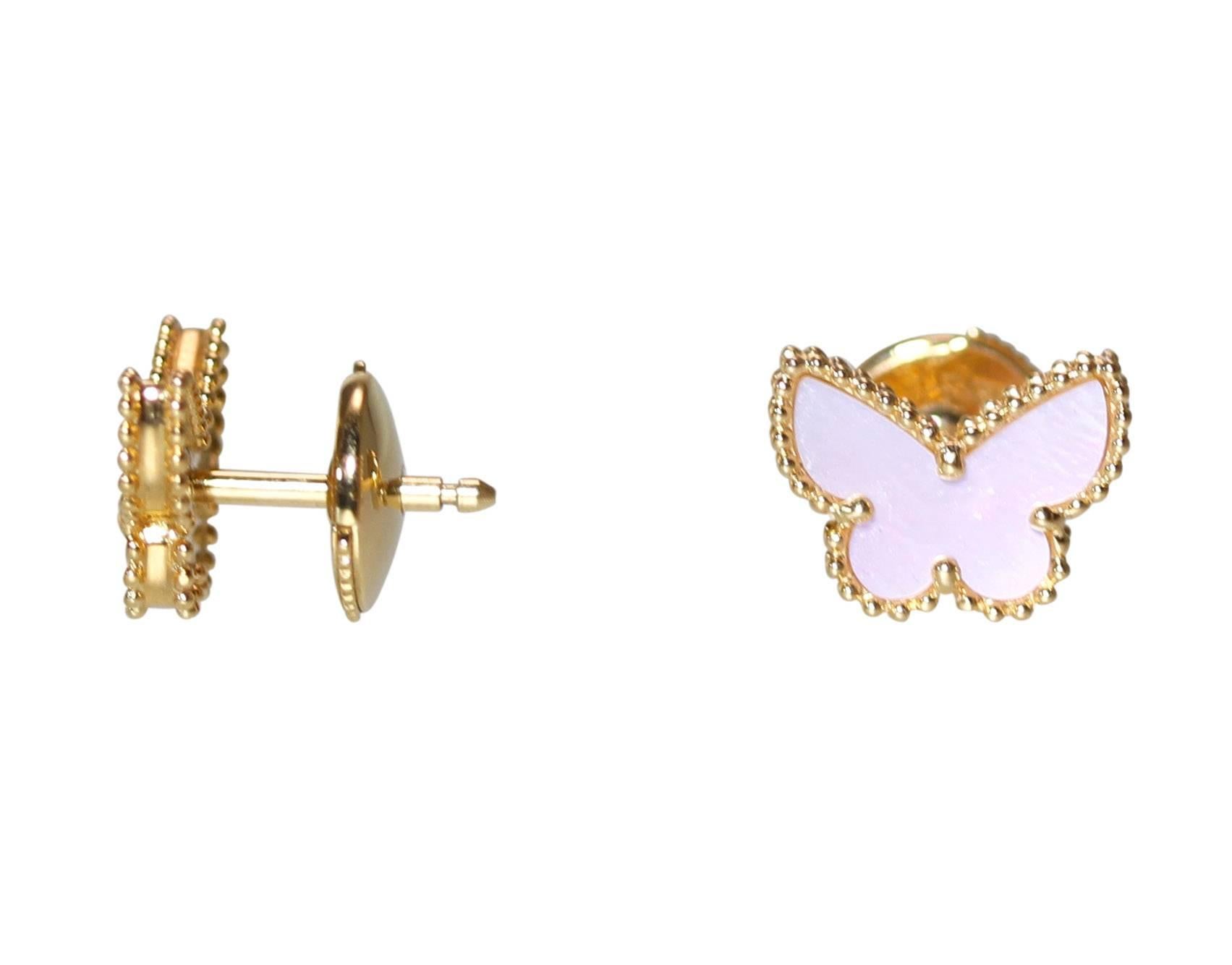 A Pair of 18 karat gold and mother-of-pearl 'Sweet Alhambra' butterfly stud earrings by Van Cleef & Arpels, each set with carved mother-of-pearl, measuring 1/4 by 3/8 inch, gross weight 2.5 grams, signed VCA, numbered JB122272, stamped G750.