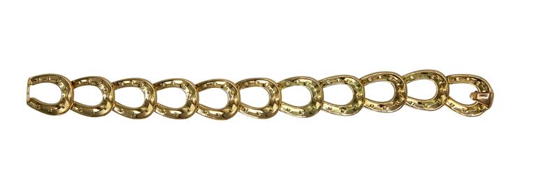 Hermès Gold Horseshoe Link Bracelet at 1stDibs | hermes horseshoe