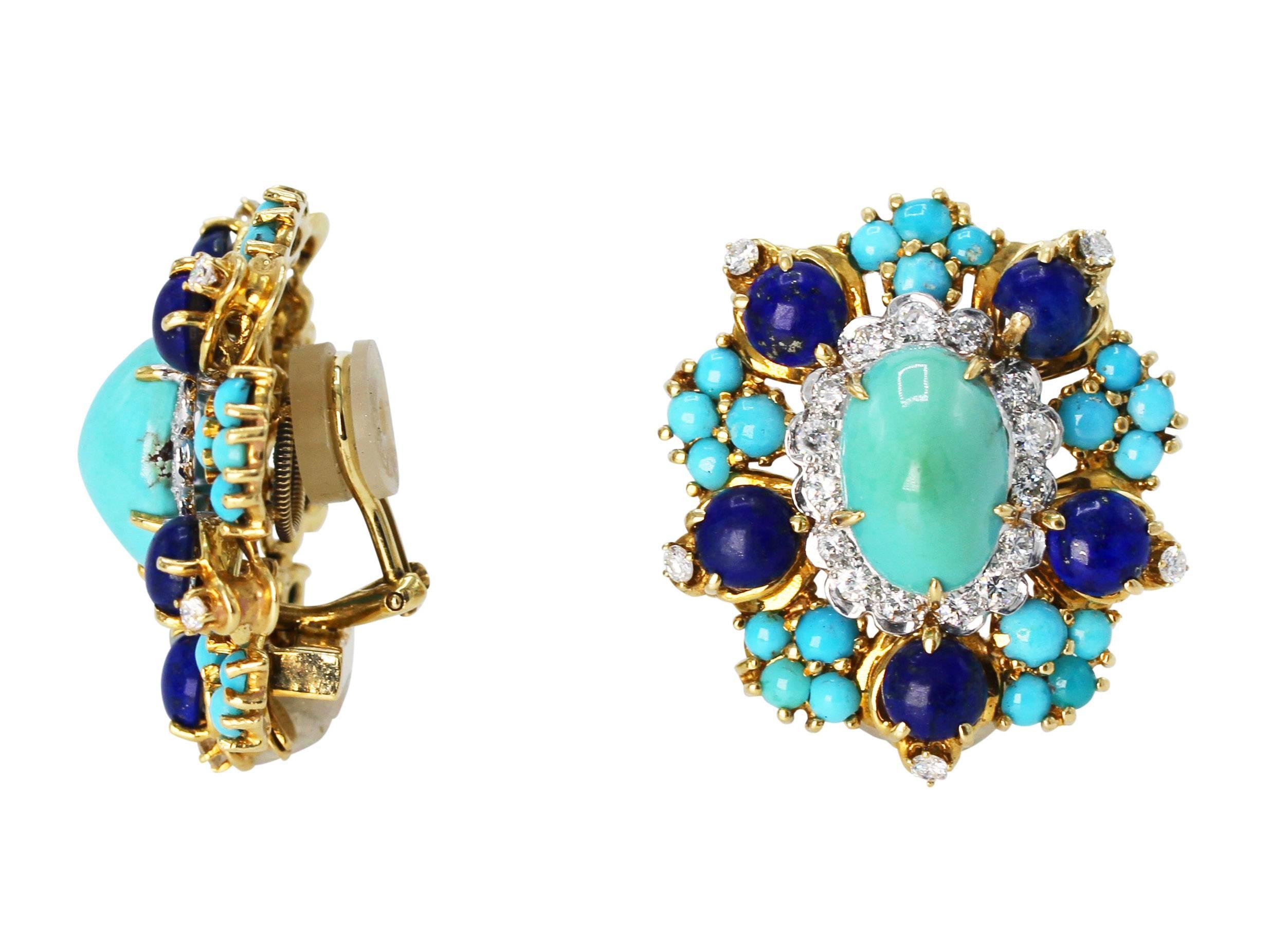 Pair of 18 Karat Gold, Turquoise, Lapis Lazuli and Diamond Earclips by Cartier
• Signed Cartier
• Numerous turquoise and lapis lazuli cabochons
• 42 round diamonds weighing approximately 1.50 carats
• Measuring 1 1/4 by 1 1/8 inches
• 18 karat