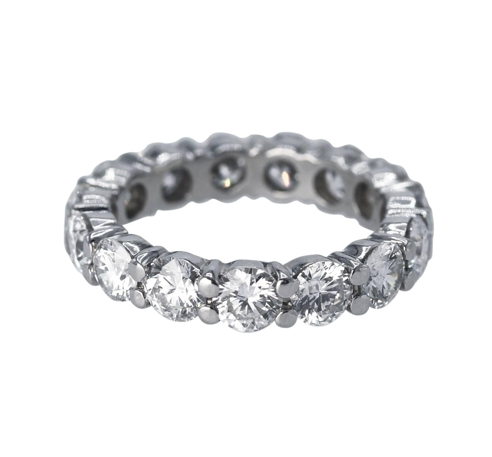 Platinum and Diamond Eternity Ring
• 15 round diamonds weighing approximately 4.00 carats, G-H color, VS1-VS2 clarity
• Size 6 1/4, shared prongs, gross weight 6.4 grams