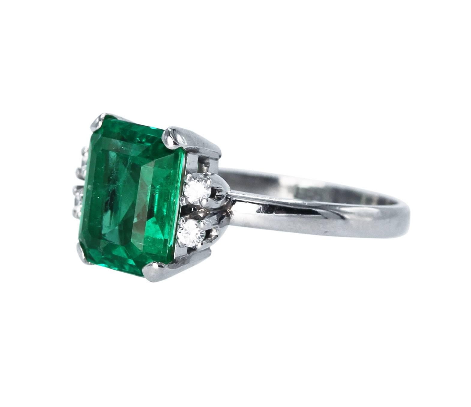 Platinum, Emerald and Diamond Ring
• Emerald-cut emerald weighing 2.76 carats
• AGL report stating the emerald to be of Colombian origin with Traditional, Insignificant oil
• 4 round diamonds approximately 0.12 carat
• Size 6 1/4, gross weight 5.1