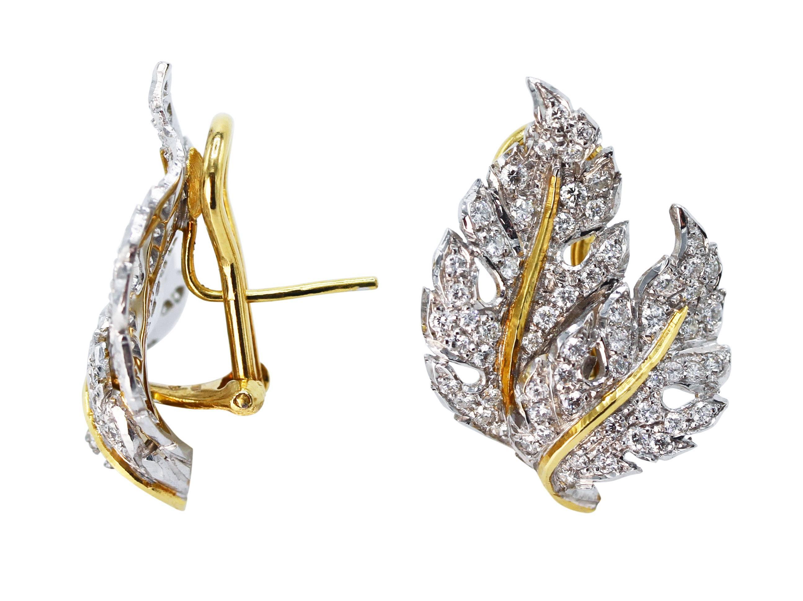 Pair of 18 Karat Yellow and White Gold and Diamond Leaf Earclips by Buccellati, Italy
• Signed M. Buccellati, Italy
• 122 round diamonds weighing 1.80 carats
• Measuring 1 by 1 1/8 inches, gross weight 12.6 grams
