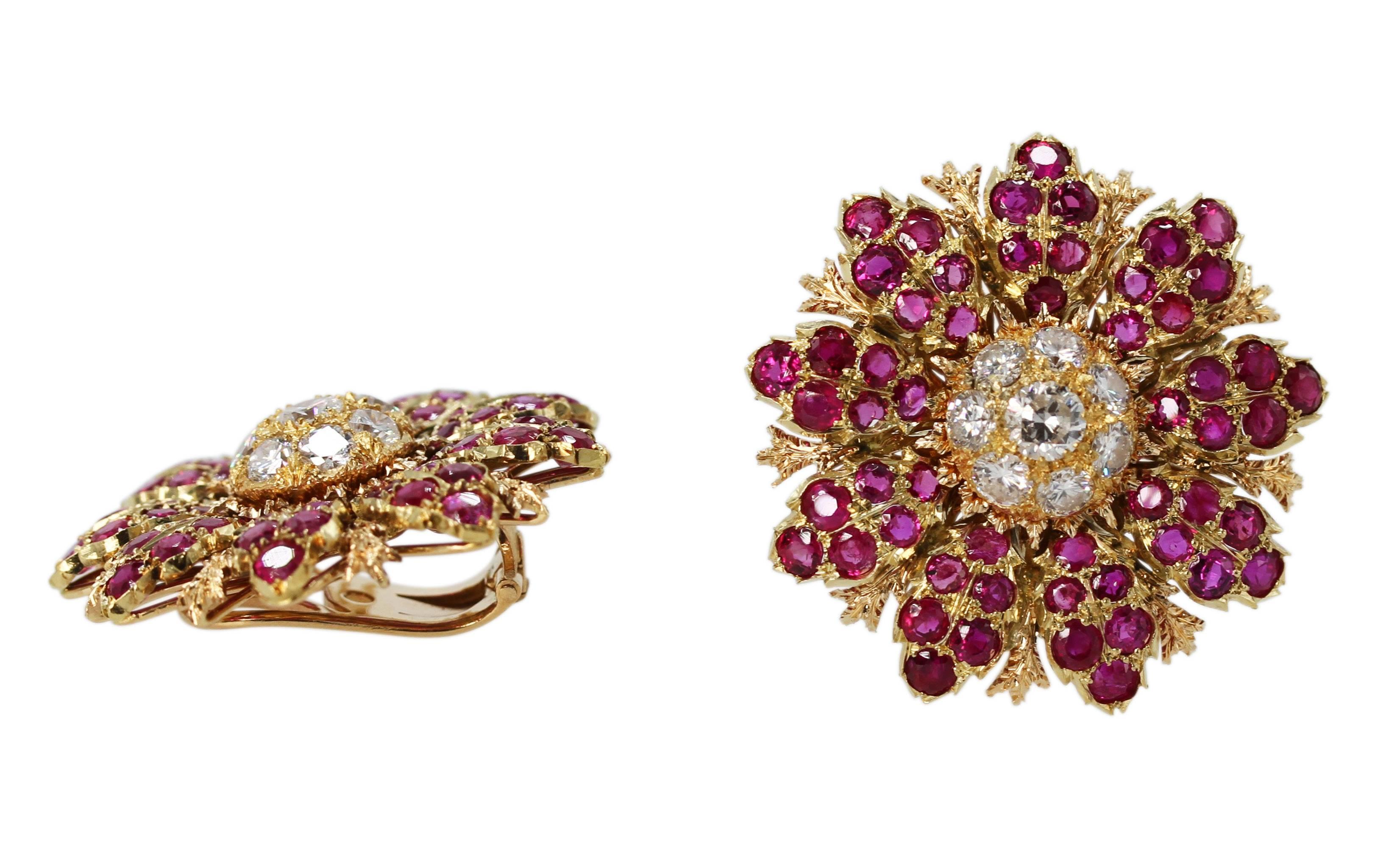 18 Karat Rose Gold, Ruby and Diamond Earrings by Buccellati, circa 1940
• Signed Buccellati Italy 750
• 16 round diamonds approximately 2.75 carats
• 108 round rubies approximately 8.00 carats
• 1 1/4 inches round, gross weight 28.8 grams