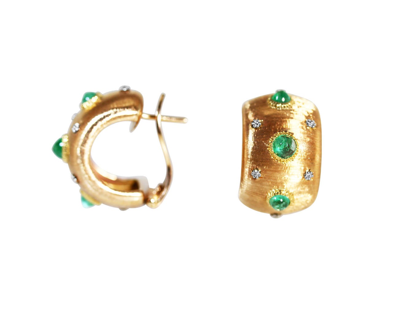 A pair of 18 karat yellow gold and cabochon emerald earclips by Buccellati, Italy, designed as halfhoops of curved form with brushed gold accents, set with 6 cabochon emeralds weighing approximately 1.50 carats, gross weight 12.2 grams, measuring