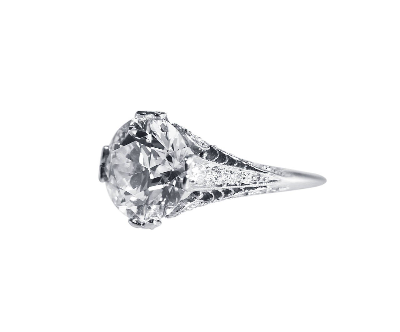 A very difficult to find original handmade Edwardian platinum and diamond ring, circa 1910 to 1915, set in the center with an old European-cut diamond weighing 4.68 carats, with in a tapered shank set throughout with 44 old European-cut diamonds