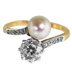 Antique Early 20th Century Natural Pearl and Diamond Crossover Ring