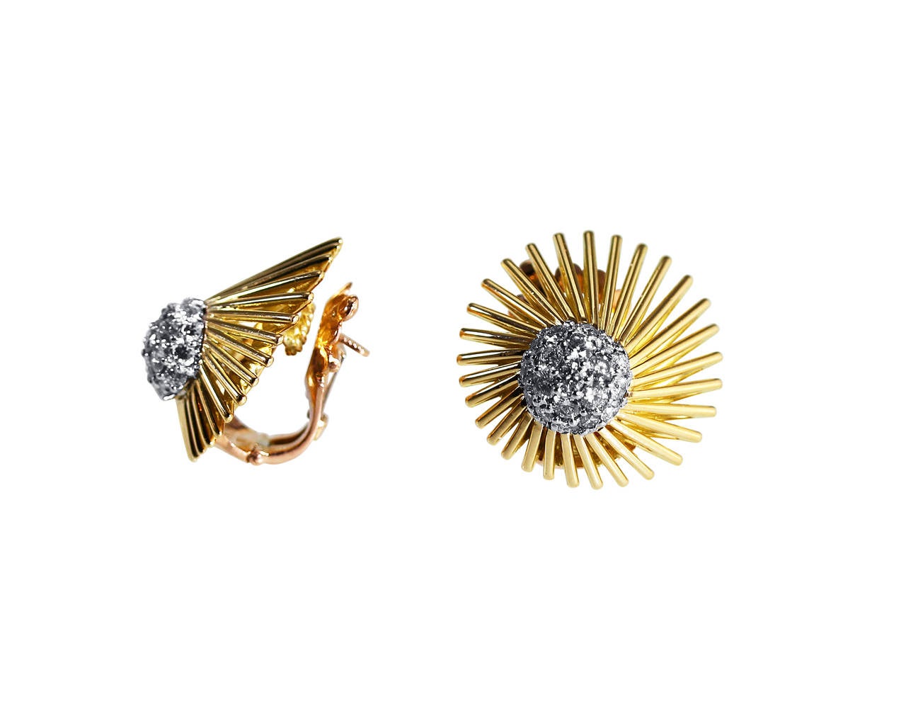 A pair of 18 karat yellow gold, platinum and diamond Meteor earclips by Van Cleef & Arpels, France, designed as sunburst of polished gold tendrils set in the center with bombe plaques set throughout with 38 round diamonds weighing approximately 1.50
