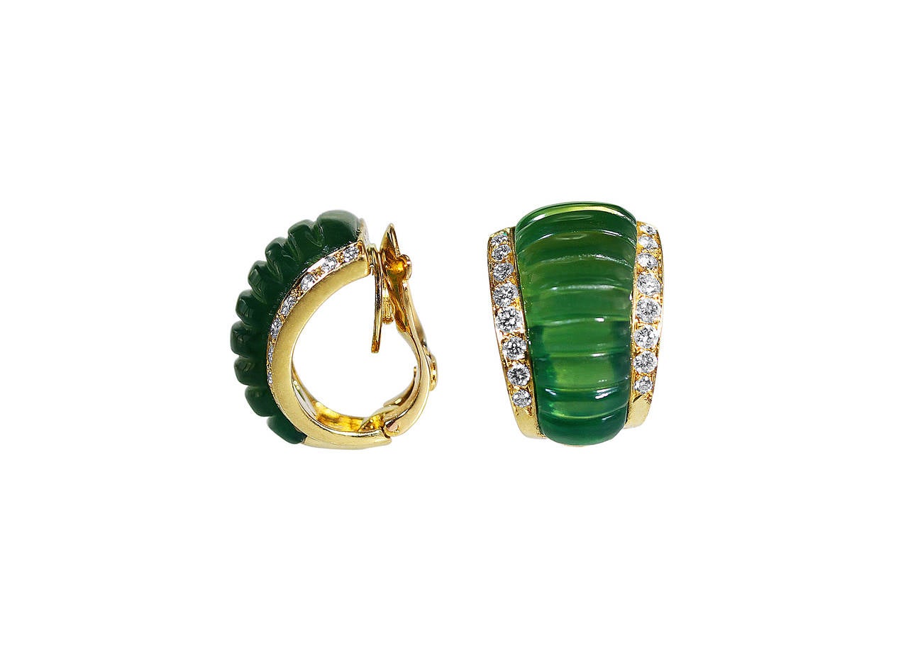 Pair of 18 karat yellow gold chrysoprase and diamond earclips by Van Cleef & Arpels, with carved fluted chrysoprase flanked by round diamonds weighing approximately 0.60 carat, with French marks, makers marks and numbered B3466, gross weight