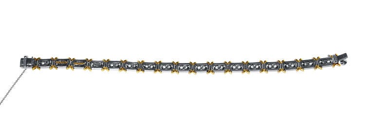 Tiffany & Co. Schlumberger Diamond Gold Platinum 36 Stone Bracelet In Good Condition In Atlanta, GA