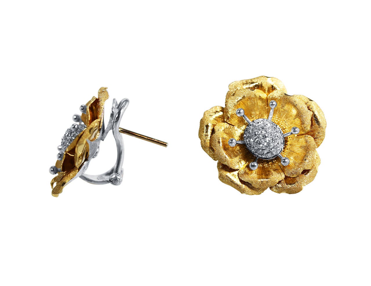 A pair of 18 karat two-tone gold and diamond flower earrings by Buccellati, Italy, the flower heads set with 38 round diamonds weighing approximately 0.40 carat, gross weight 10.6 grams, measuring 7/8 inch in diameter. Signed M Buccellati, Italy,