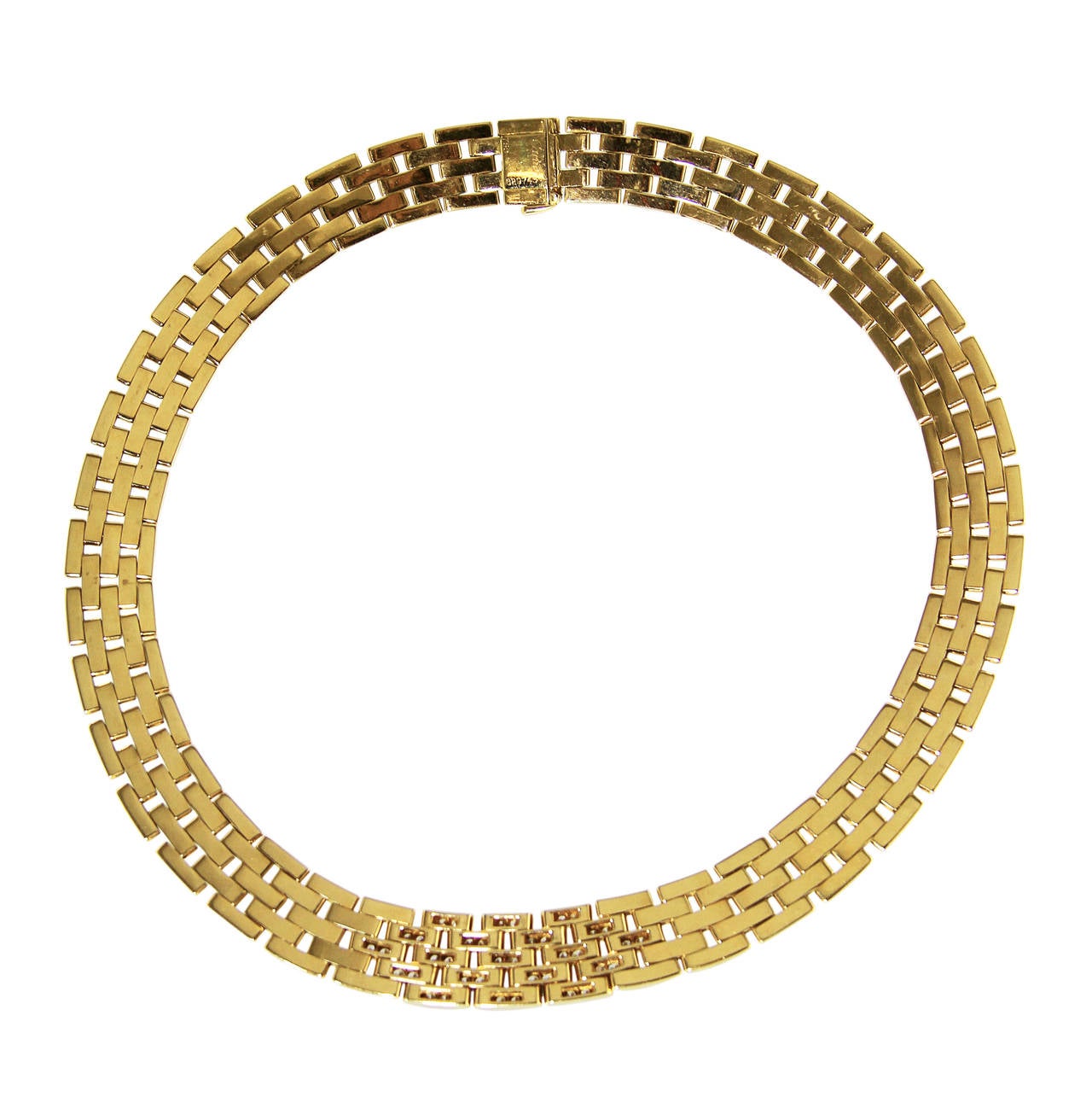An 18 karat yellow gold and diamond 'Panthere' necklace by Cartier, the wide flexible strap designed as interlocking polished gold links set at the front with 76 round diamonds weighing approximately 1.50 carats, gross weight 139.7 grams, length 16