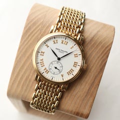 Patek Philippe Calatrava 33mm 5022/1J 18K Yellow Gold White Dial Watch