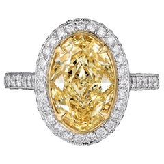 GIA Certified 2.61 Carat Light Yellow Oval Diamond Engagement Ring In Platinum