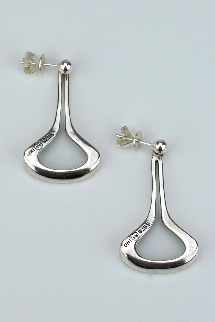 A pair of solid silver open drop shape earrings - each earring consisting of an open flat bottomed drop shape with an inner oxidised each on a ball and post fitting

- marked for Uni for Uni Andersen of David Andersen of Oslo
- total weight of