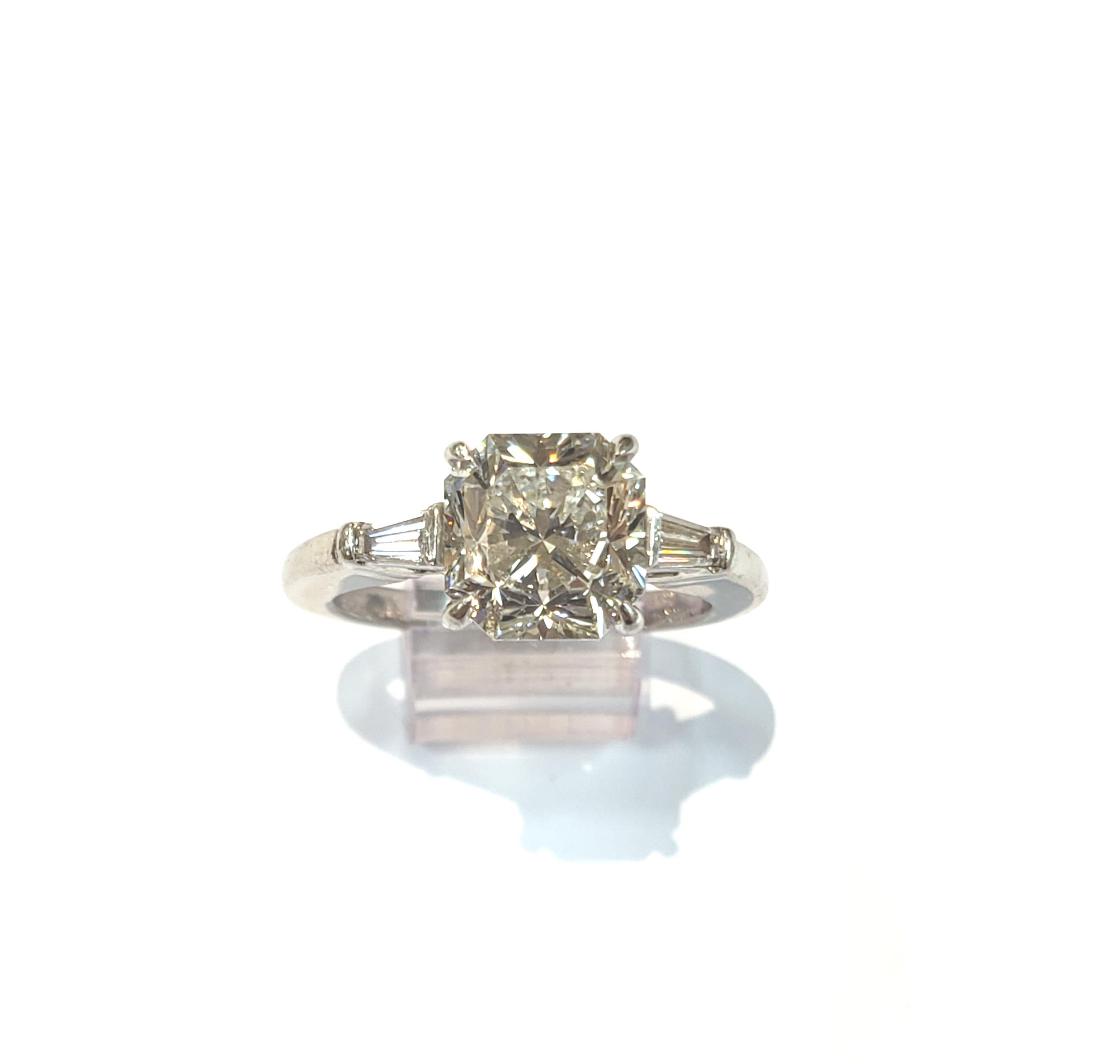 Women's or Men's Tiffany & Co. Lucida Diamond Ring, Set in Platinum with Tapered Baguettes