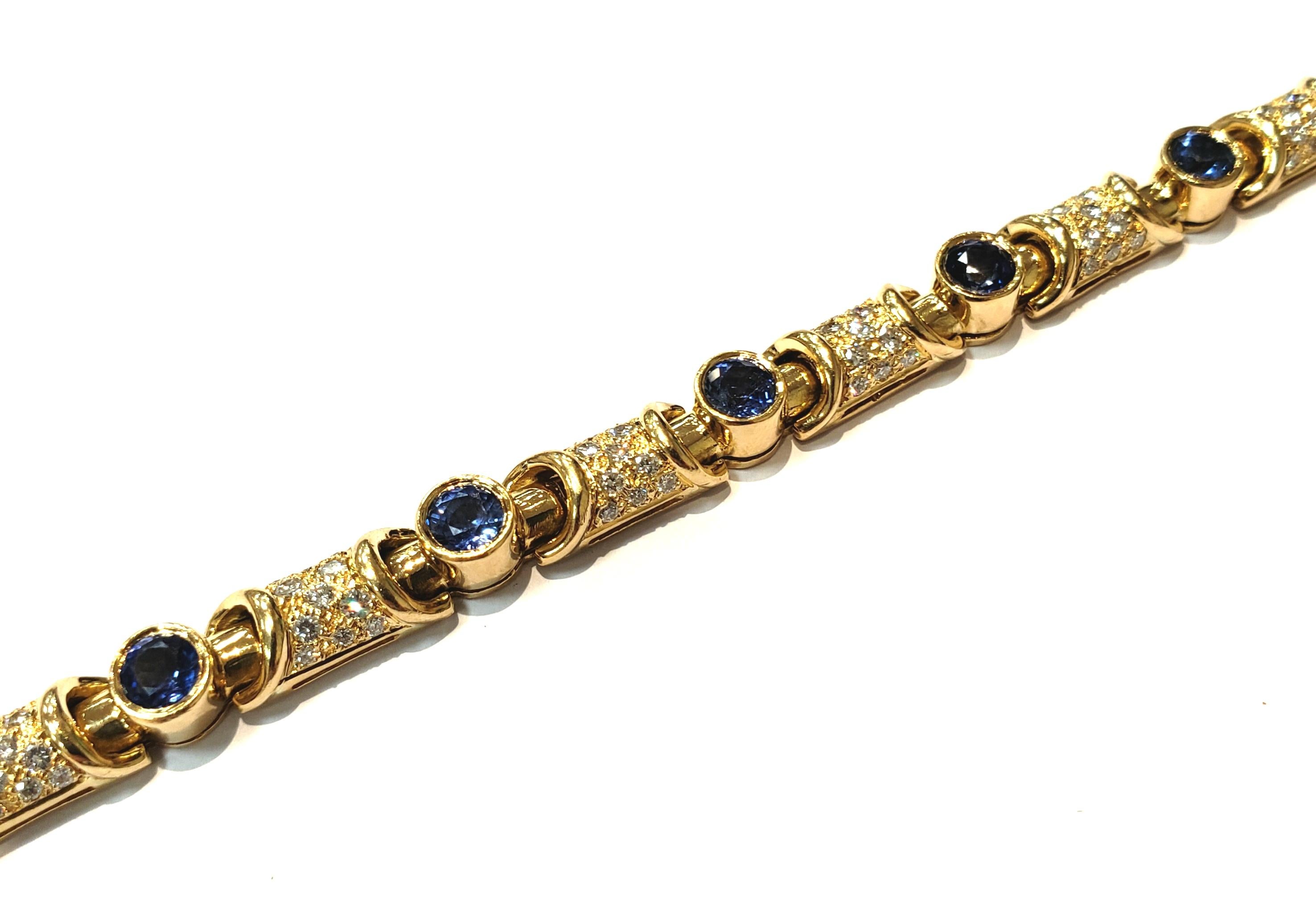 Round Cut 18 Karat Yellow Gold and Diamond Link Bracelet with Bezel Set Blue Sapphires For Sale