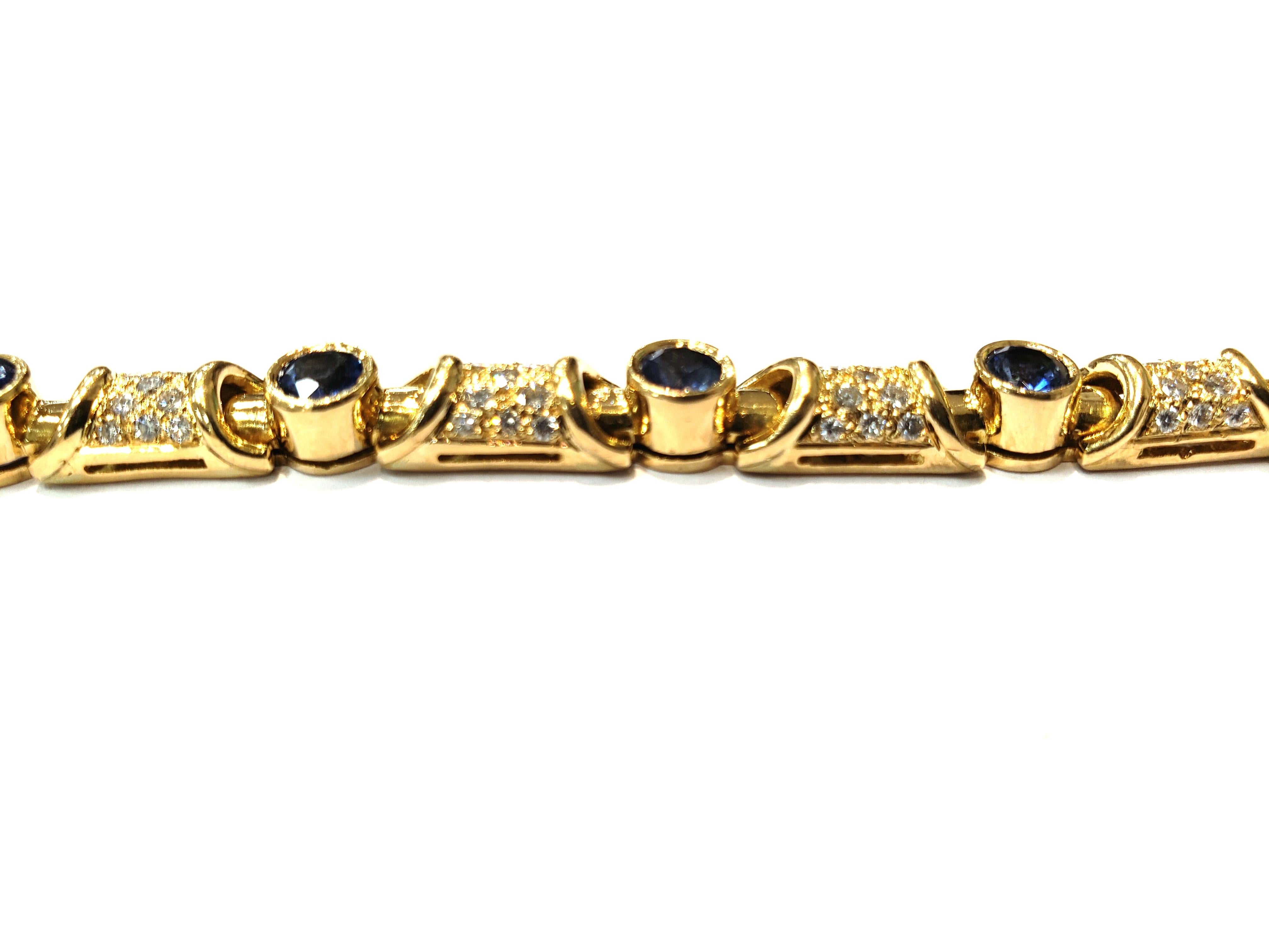 Women's or Men's 18 Karat Yellow Gold and Diamond Link Bracelet with Bezel Set Blue Sapphires For Sale