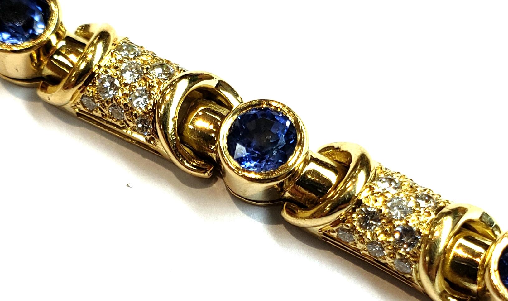 18 Karat Yellow Gold and Diamond Link Bracelet with Bezel Set Blue Sapphires For Sale 3