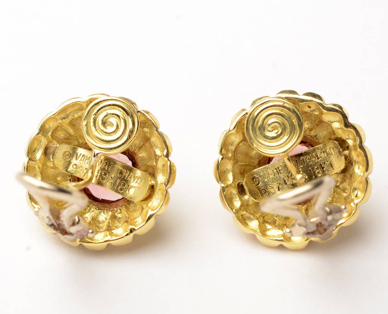 Tiered scallop design earrings centered with tourmaline  by Vahe Naltchayan. They are 18 karat gold with 14 karat white gold omega backs. They measure 5/8