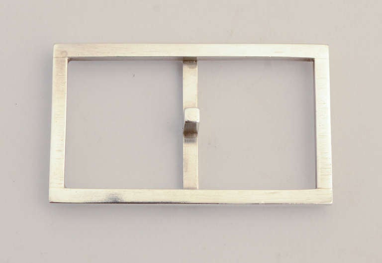 Sterling silver belt buckle by modernist designer, Betty Cooke. It is the ultimate in simplicity as her designs usually are.
The buckle measures 2 1/4
