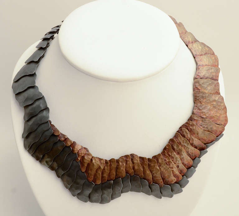 This extraordinary necklace was made by Mexican architect turned jeweler, Eduardo Herrera. It is made of oxidized 950 silver (higher quality than sterling) and tumbaga. Tumbaga is a pre-Colombian technique used in Mesoamerica and South America to