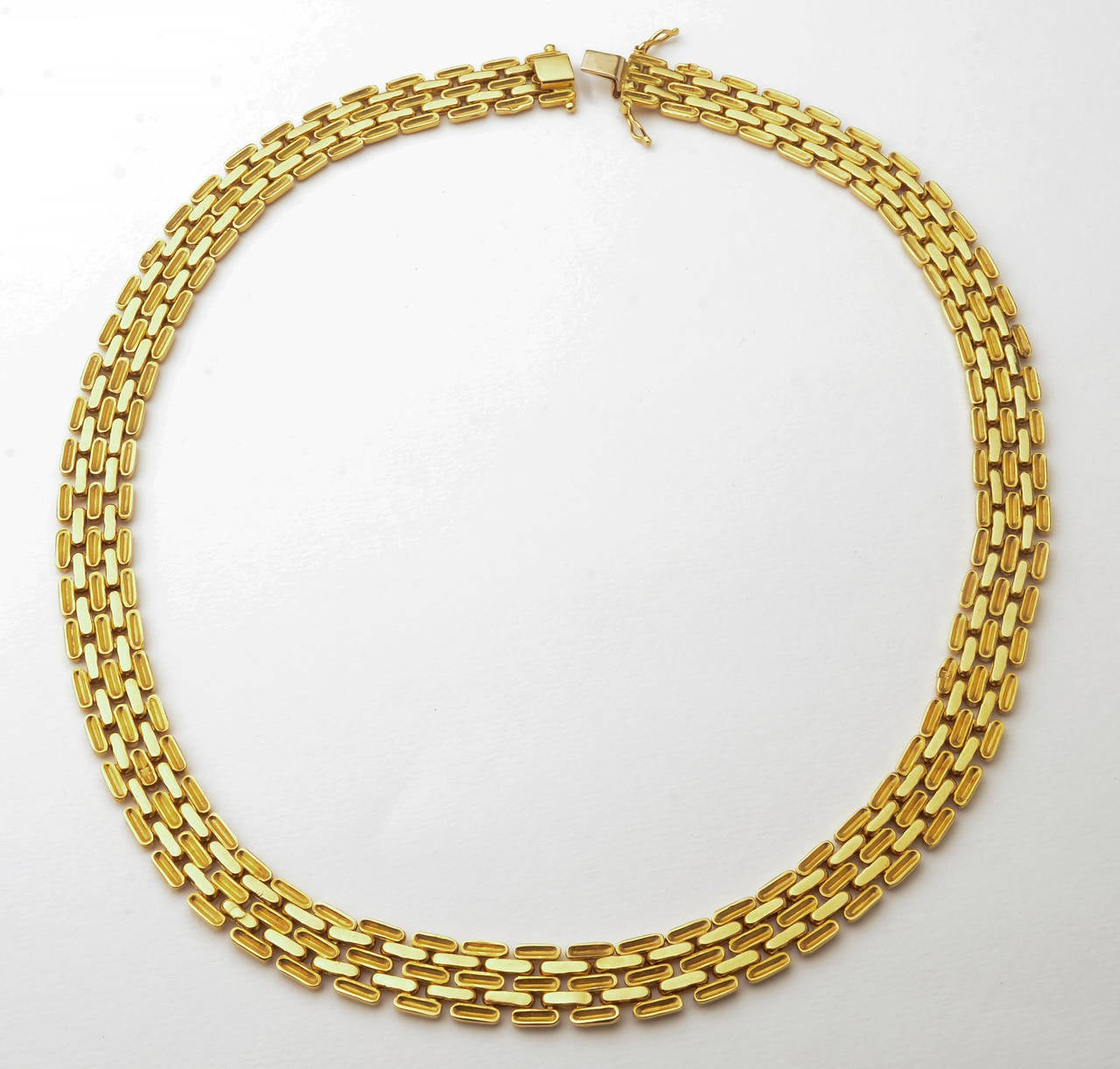 Wonderfully wearable 18 karat gold necklace of five rows of long oval links. It measures 17 1/2