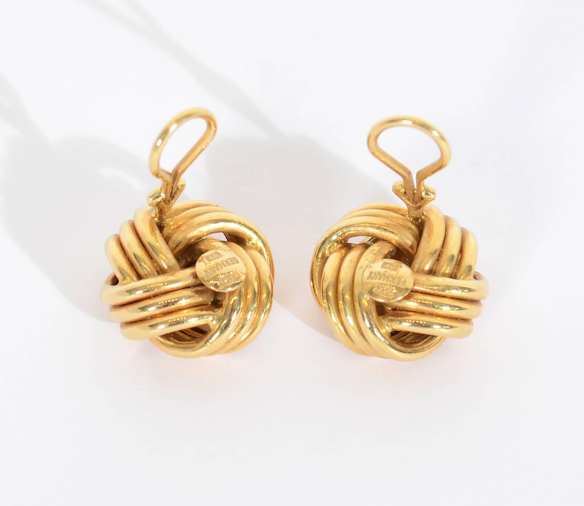 These classic knot earrings are nicely made with  triple strands. They measure 7/8