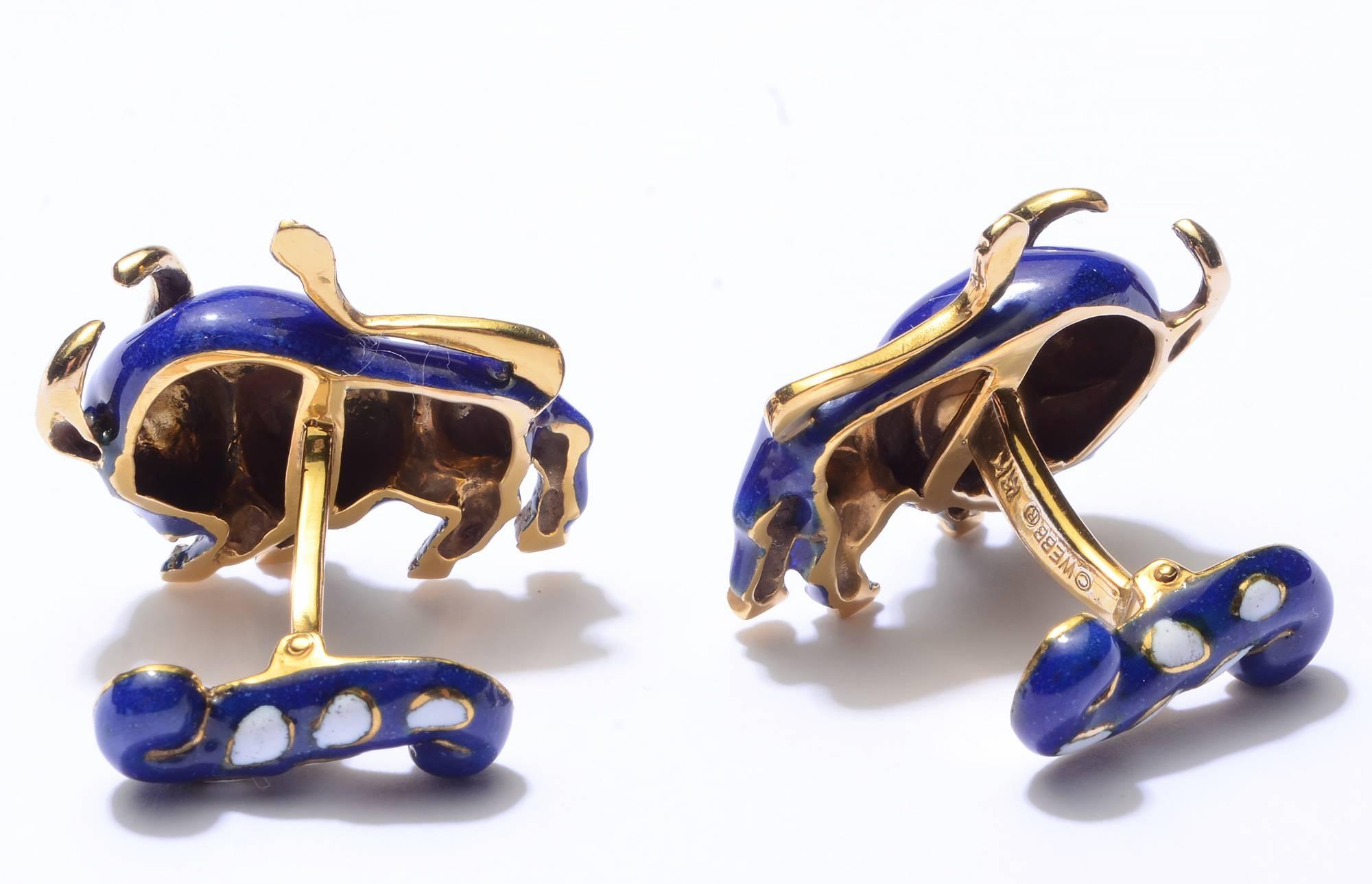 These exceptional Bull cufflinks by David Webb are perfect miniature sculptures. Both the body of the animal as well as the toggle are beautifully decorated.They are a stunning cobalt blue color. Thematically, they are ideal for either the