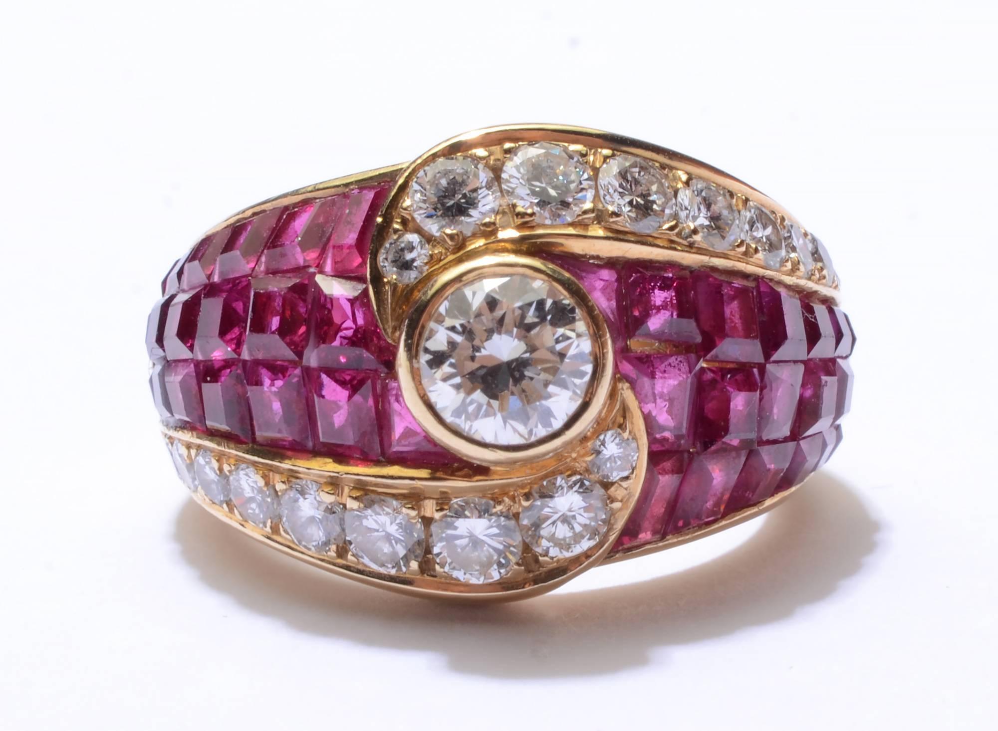 Stunning and graceful diamond ring with invisibly set Burma rubies. The central diamond is .5 carats; VS quality
Size 6 - can be modified