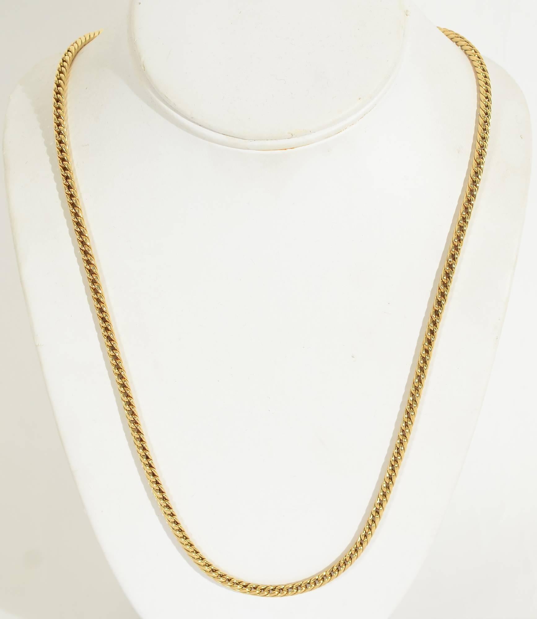 Classic handwoven 18 karat gold chain by Van Cleef & Arpels. It measures 35 inches in wearable length so it can be worn singly or doubled. It is 1/4 of an inch in width . Made with a secure push clasp and safety.