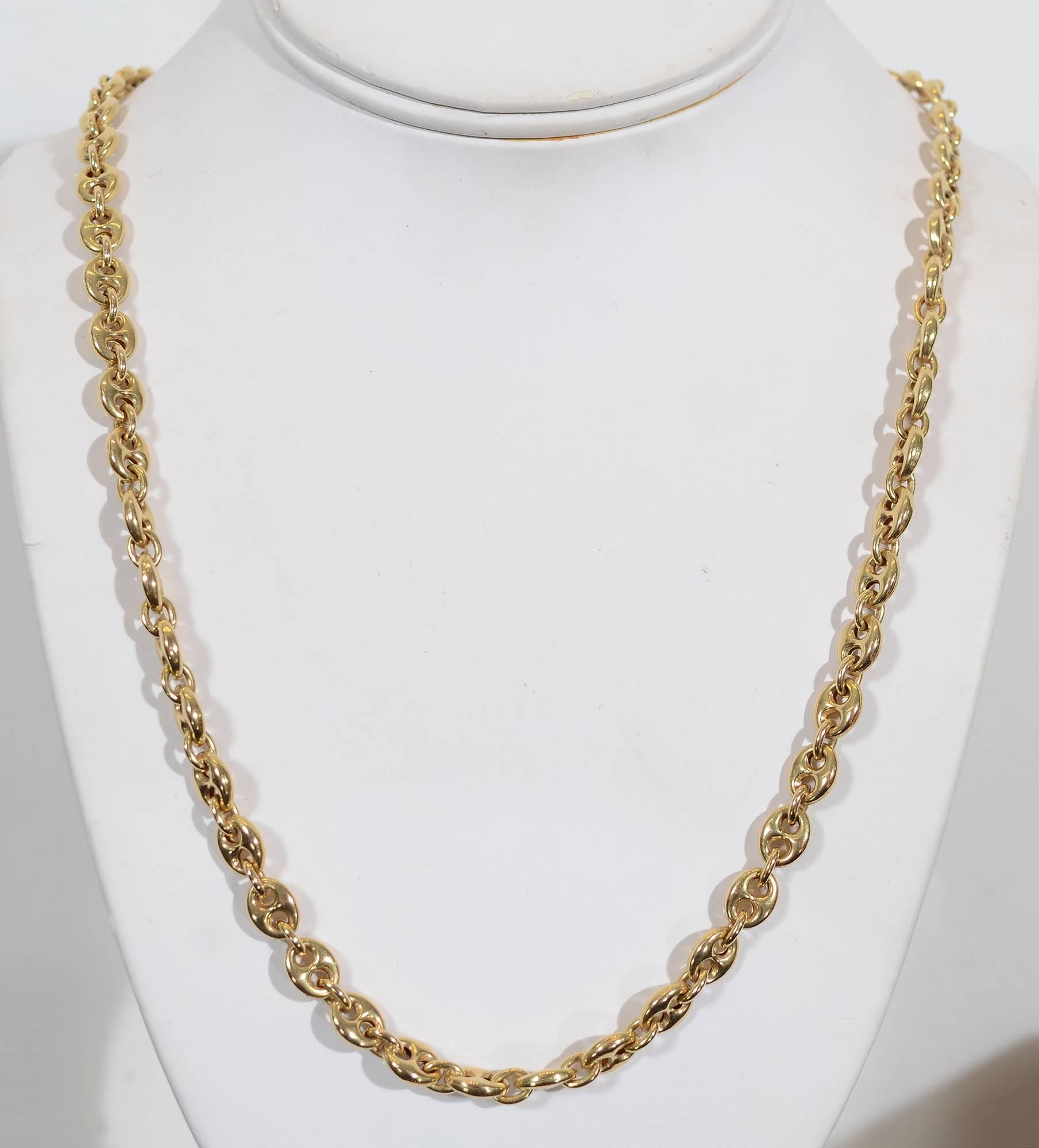 Classic gold chain necklace done with what is referred to as the Gucci link. It measures 42 inches long so it can be worn as either a single length or doubled. One can also hang a pendant from it.