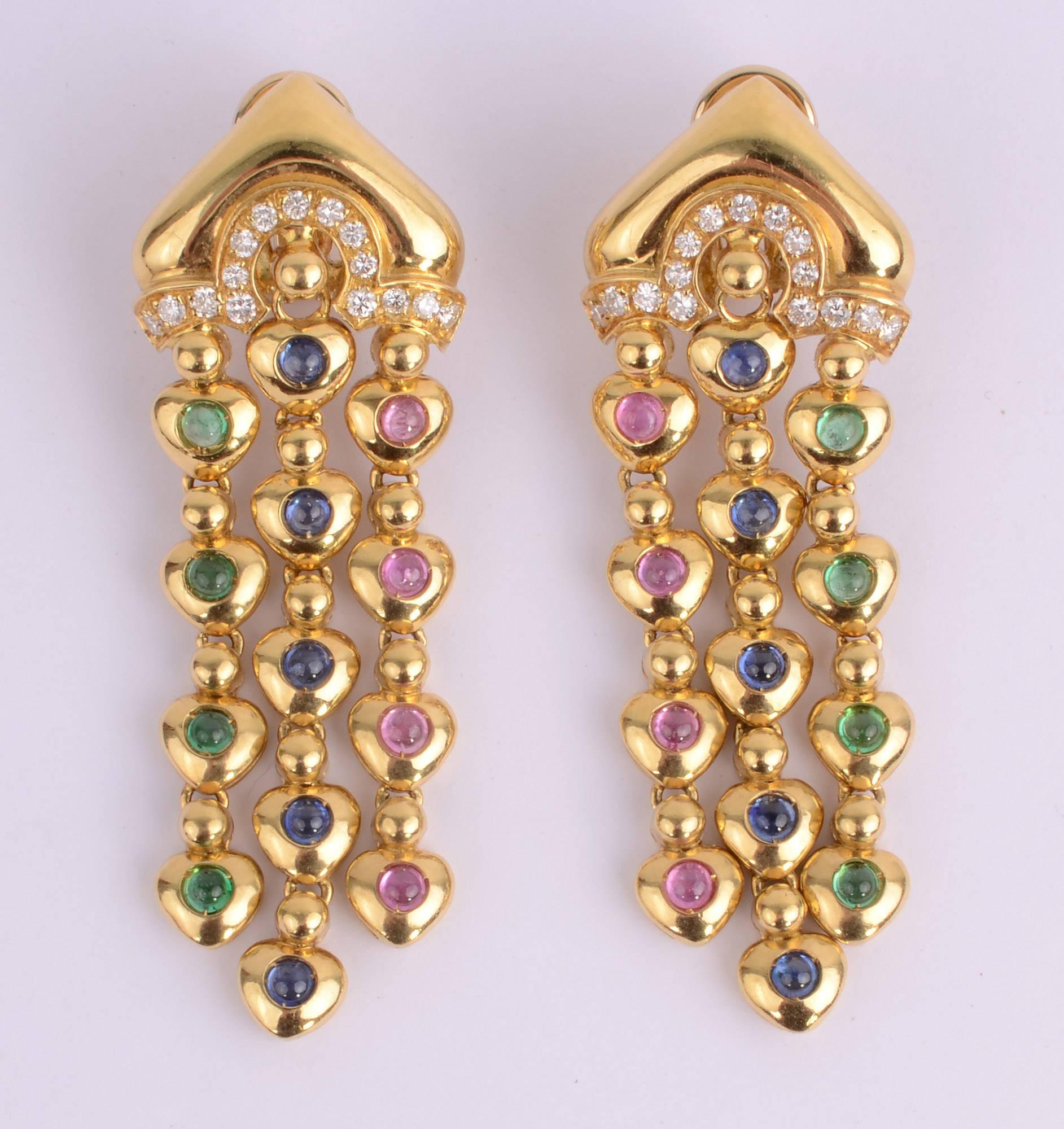 Exquisite 18 karat gold dangle earrings by Salavetti with diamonds on top and strands of pink, green and blue tourmalines. They measure 2 5/8 inches in length and 7/8 inch in width across the top. The nicely detailed backs are evidence of the fine