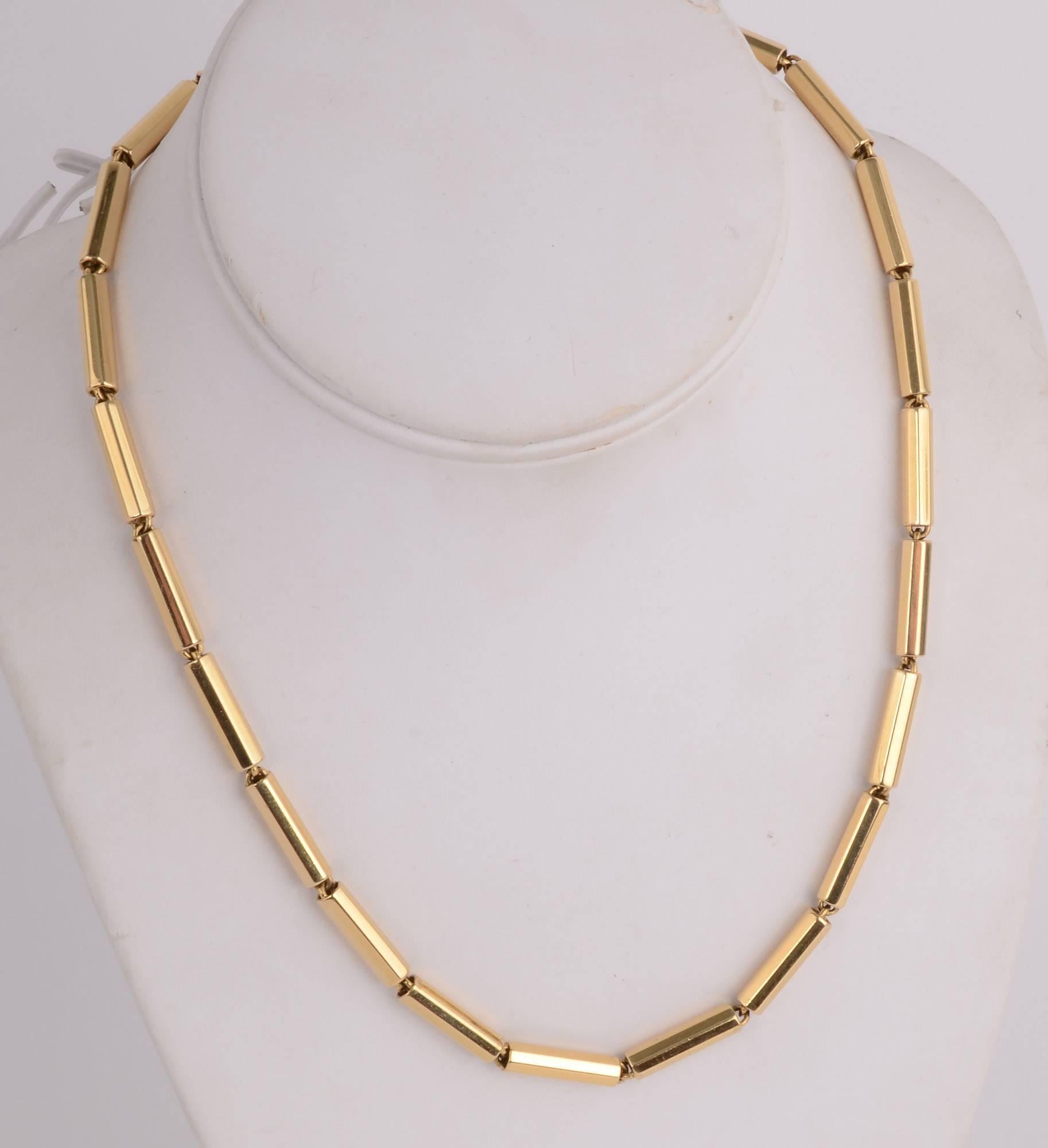 This versatile 18 karat gold chain is by Gubelin, a Swiss firm that has been making fine watches and jewelry since 1854. 
The tubular chain necklace is substantial enough to be worn well on its own or a pendant can be suspended from it. The necklace