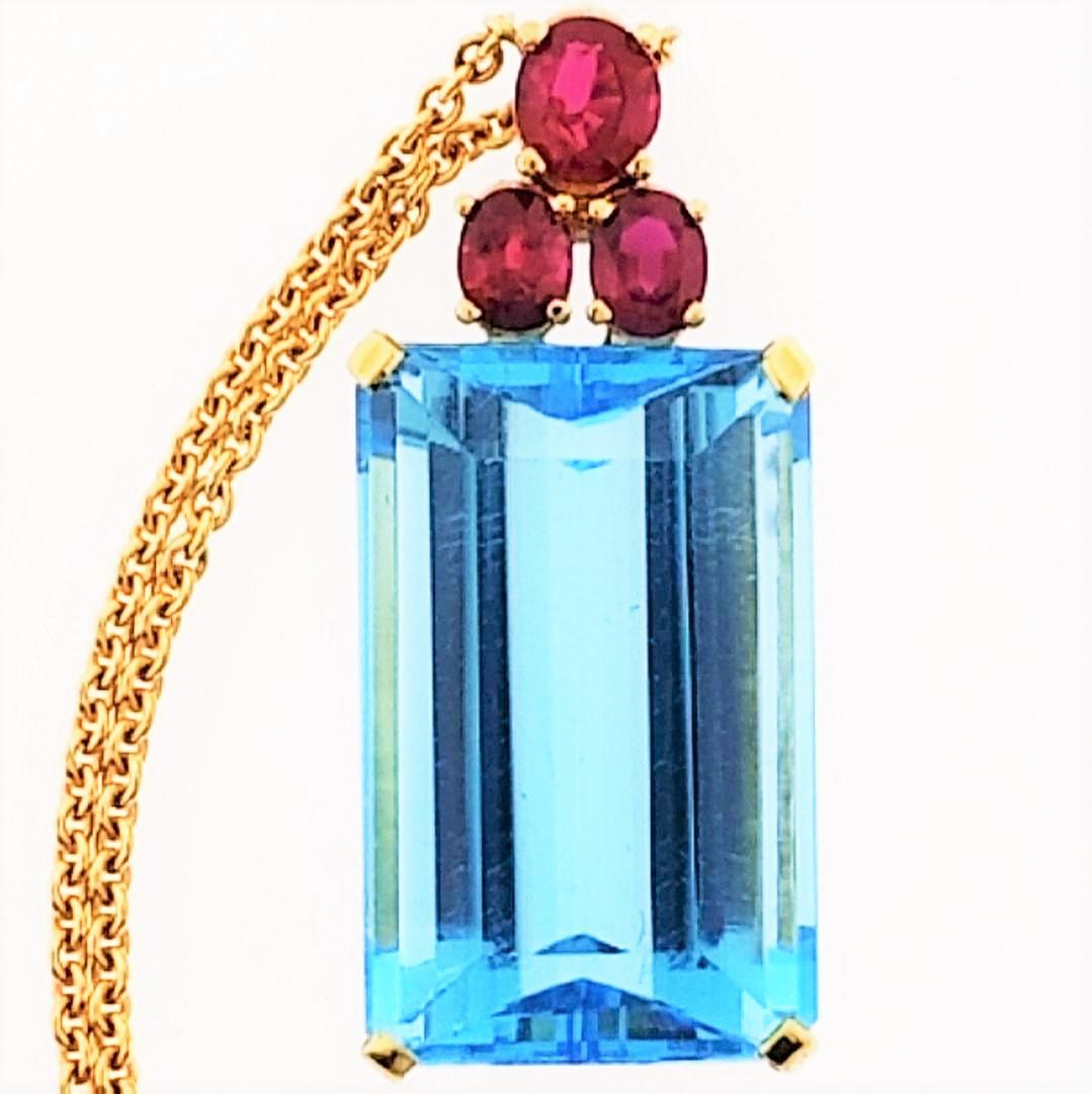Emerald Cut 18 Karat Yellow Gold, Blue Topaz '28.51 Carat', Ruby '0.83 Carat', Earrings For Sale