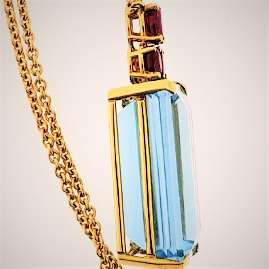 Contemporary 18 Karat Yellow Gold, Blue Topaz ‘45.88 Carat’ and Ruby ‘2.18 Carat’ Necklace For Sale