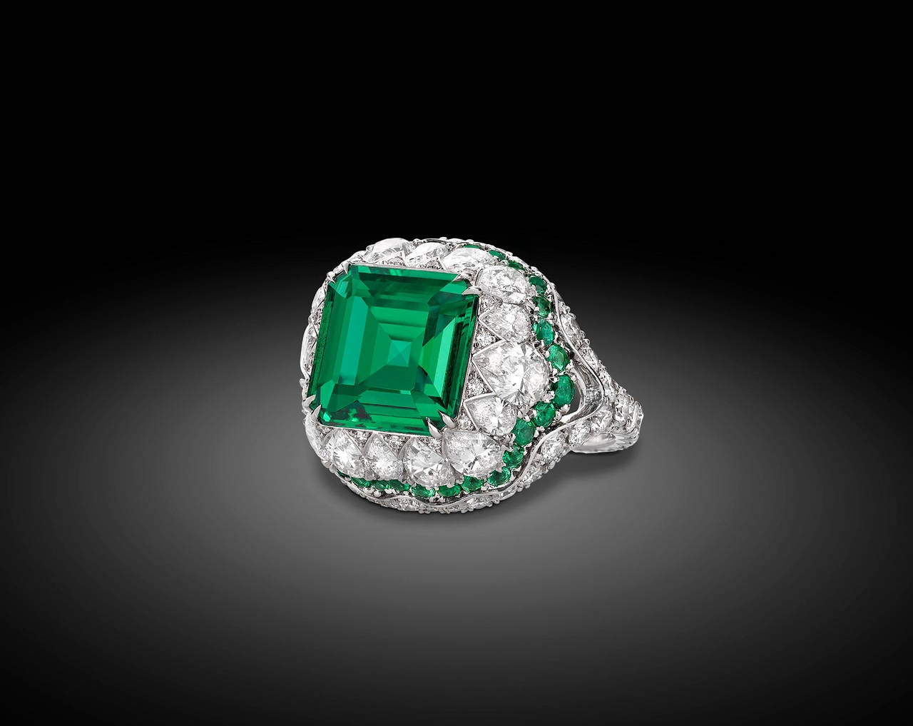 Hailing from the country of Zambia, this amazing 4.31-carat Natural emerald ring displays intense color and amazing clarity. The majority of emeralds on the market are 