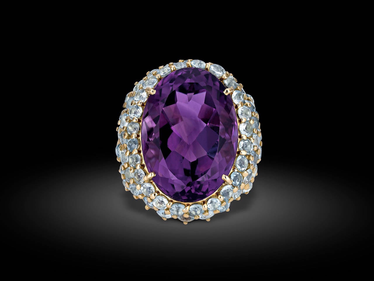 A mesmerizing amethyst weighing approximately 45.77 carats is the star of this spectacular cocktail ring by celebrated jeweler Verdura. Beautifully cut to accentuate its stunning purplish pink hue, this monumental oval-cut jewel is surrounded by a