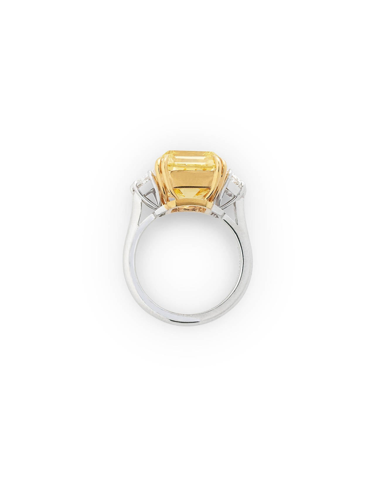 Weighing 10.75 carats, this breathtaking Fancy Intense Yellow diamond displays a vivid hue rivaled only by the brilliance of the sun. To find a stone weighing more than 5.00 carats that is Natural Fancy yellow is to find a level of perfection and