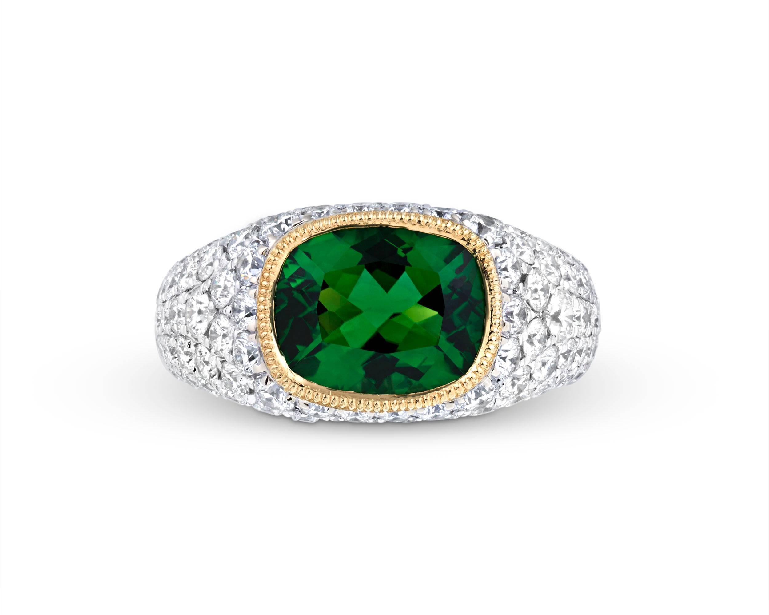 A rare 2.55-carat chrome tourmaline is on display in this breathtaking and bold ring. The extraordinary stone exhibits a refreshing and brilliant green hue that is far more dazzling than the typical green tourmaline. This is due to the stone's