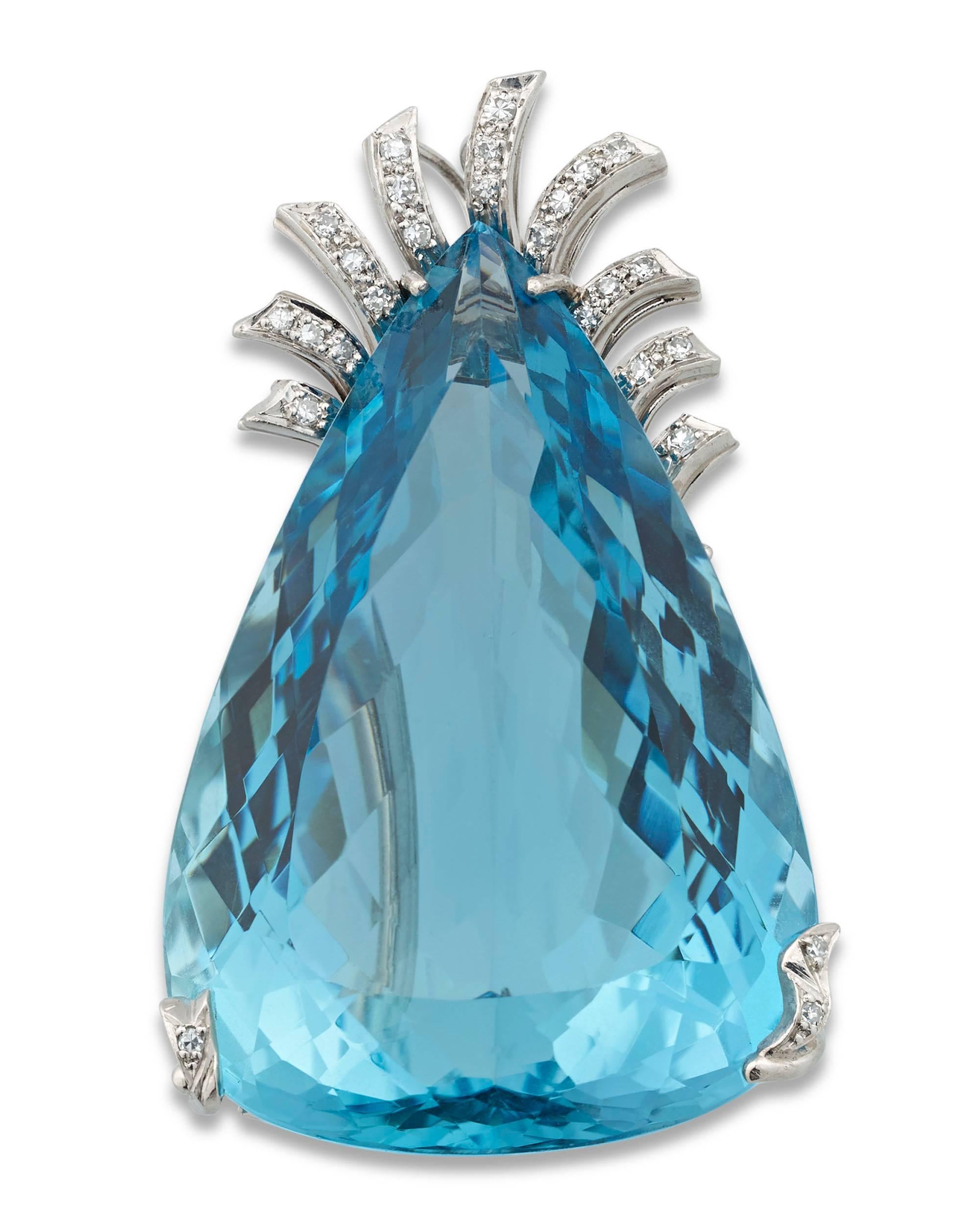 The incredible 86.40-carat aquamarine draped from this necklace captures attention with a vibrant aqua hue that rivals that of the world's oceans. The graceful pear shape is perfect for this jewel as it gives the impression of a gorgeous drop of