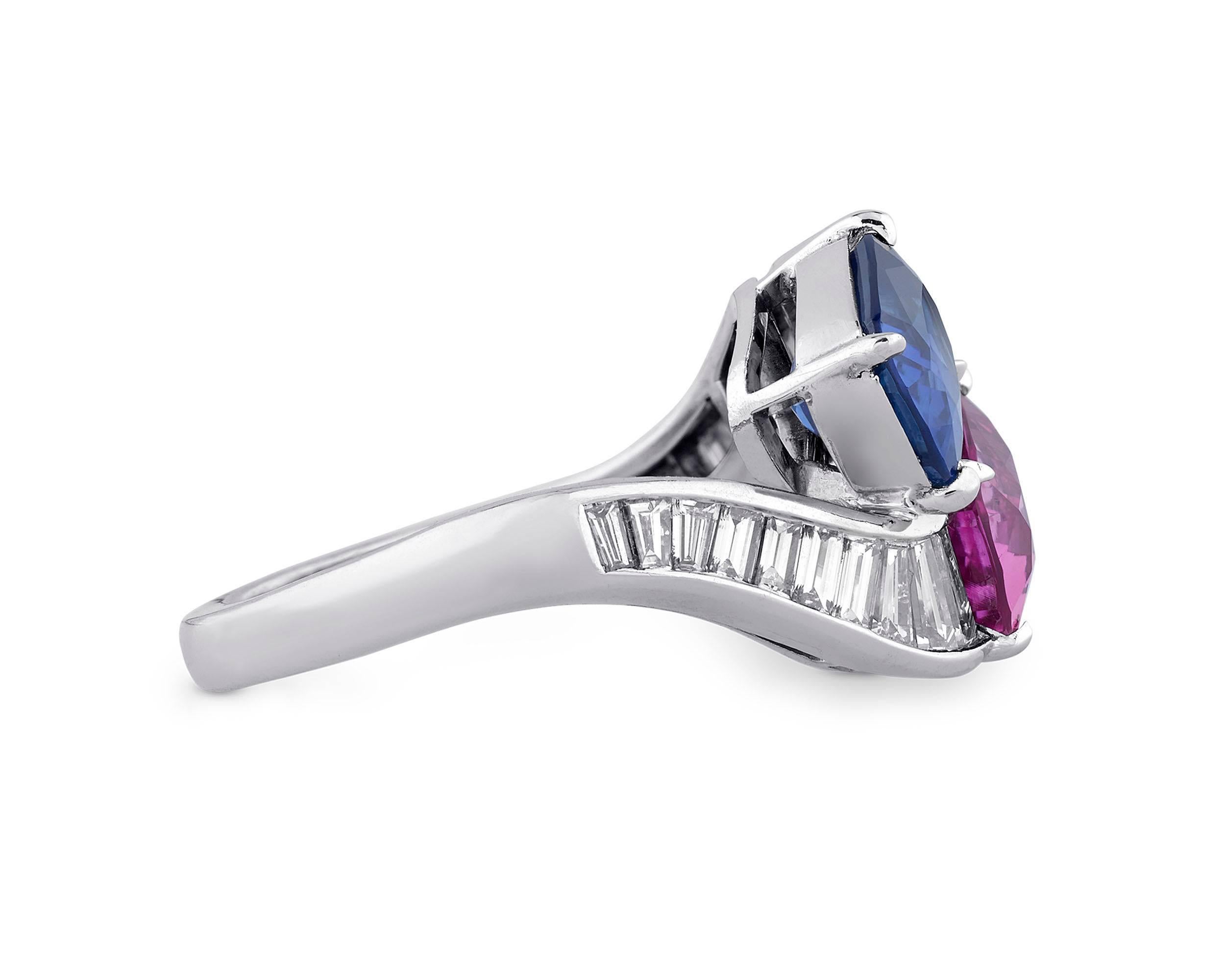 This stunning bypass ring by the legendary Bulgari beautifully showcases two exceptional sapphires. A captivating blue sapphire weighing 2.59 carats makes a perfect pair with a sumptuous pink sapphire weighing 2.67 carats. Certified by the American