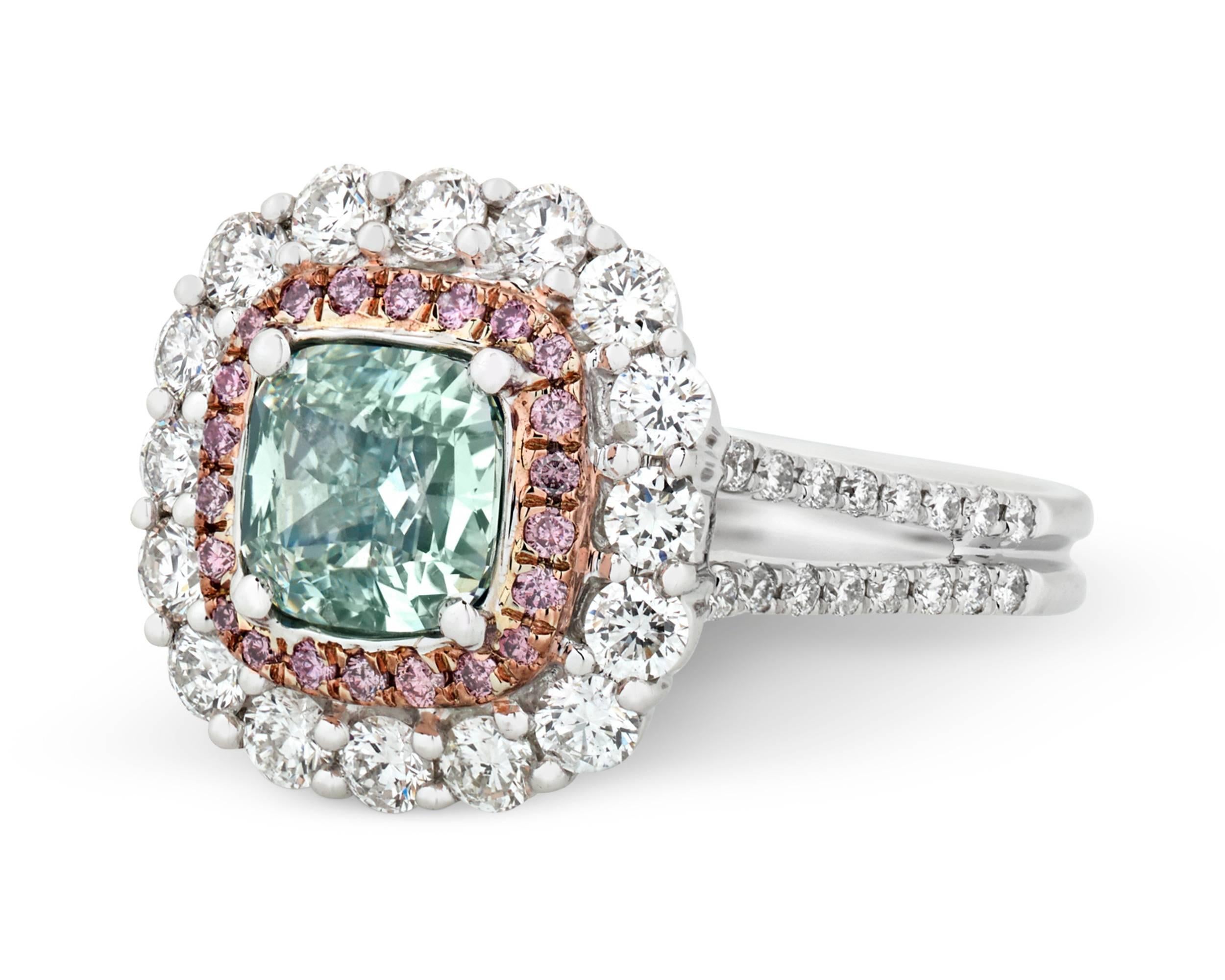 An immense rarity in the world of Fancy colored diamonds, this awe-inspiring 1.23-carat Fancy Light bluish-green diamond is one of the handfuls of green diamonds to have come on the market in the past half century. Certified by the Gemological