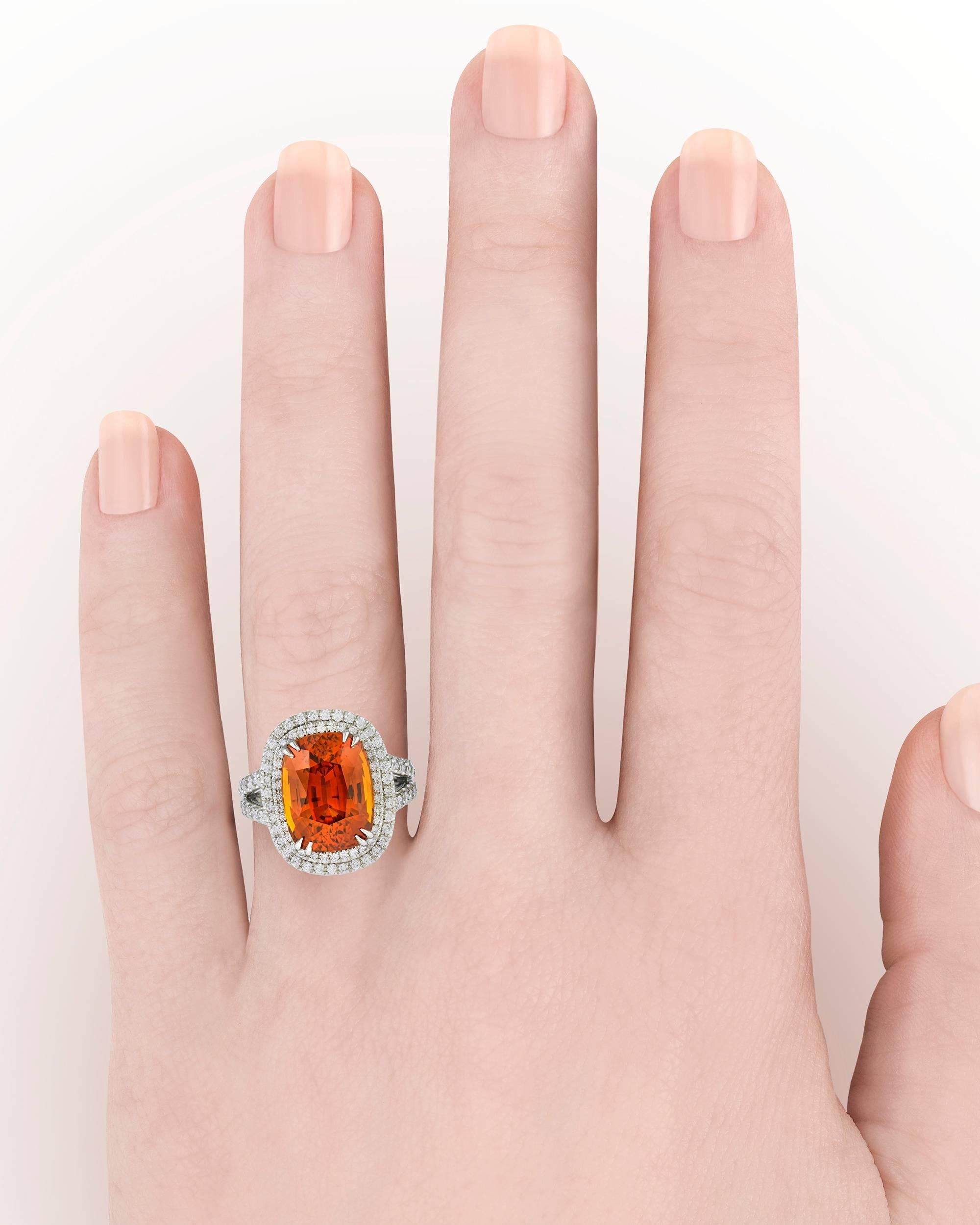 orange and blue sapphire ring