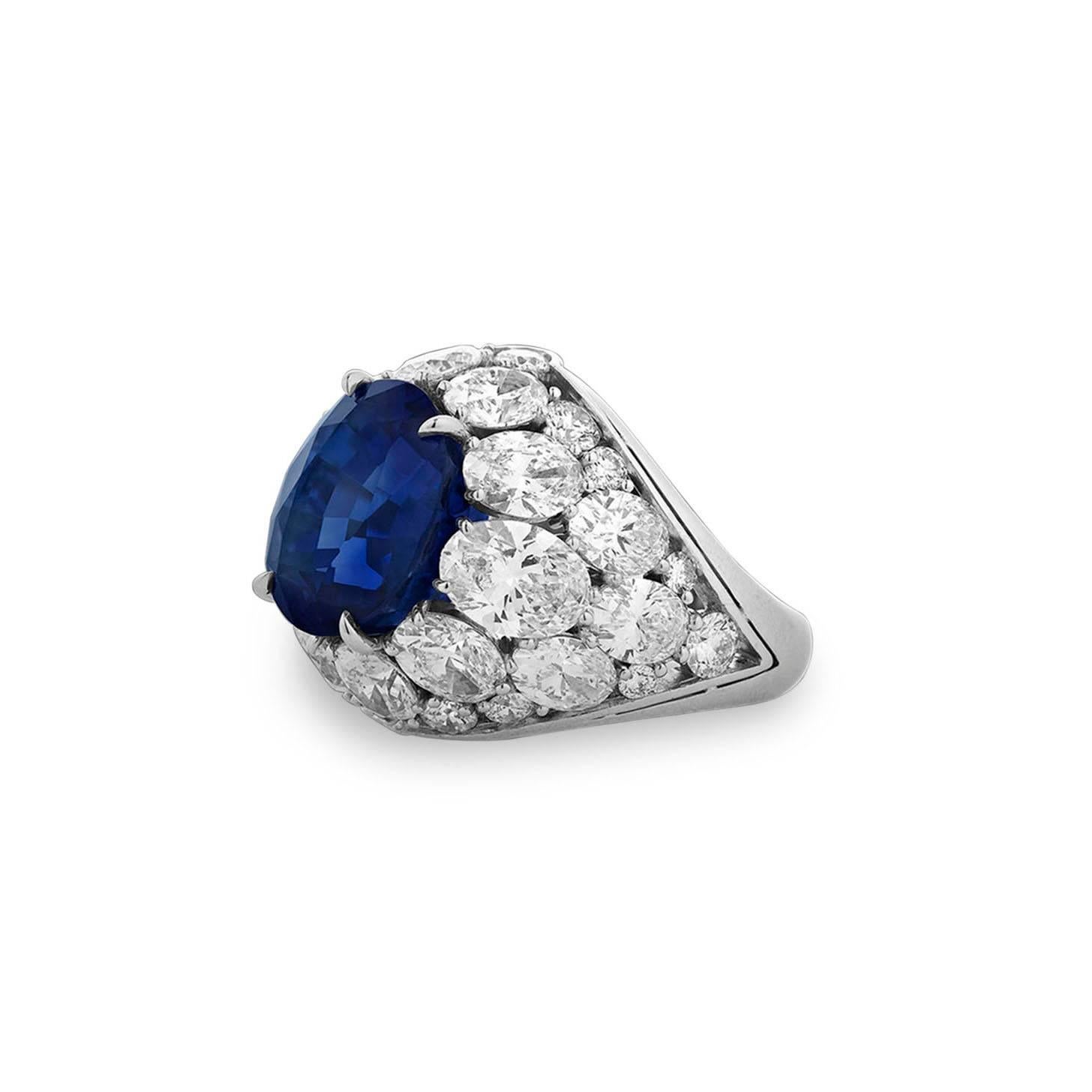 The breathtaking color and rarity of this natural, “no-heat” Burma sapphire is perfectly presented in this fabulous platinum ring. This 10.30-carat sapphire exhibits the perfect velvety blue, the color most prized in Burma sapphires. The stone is